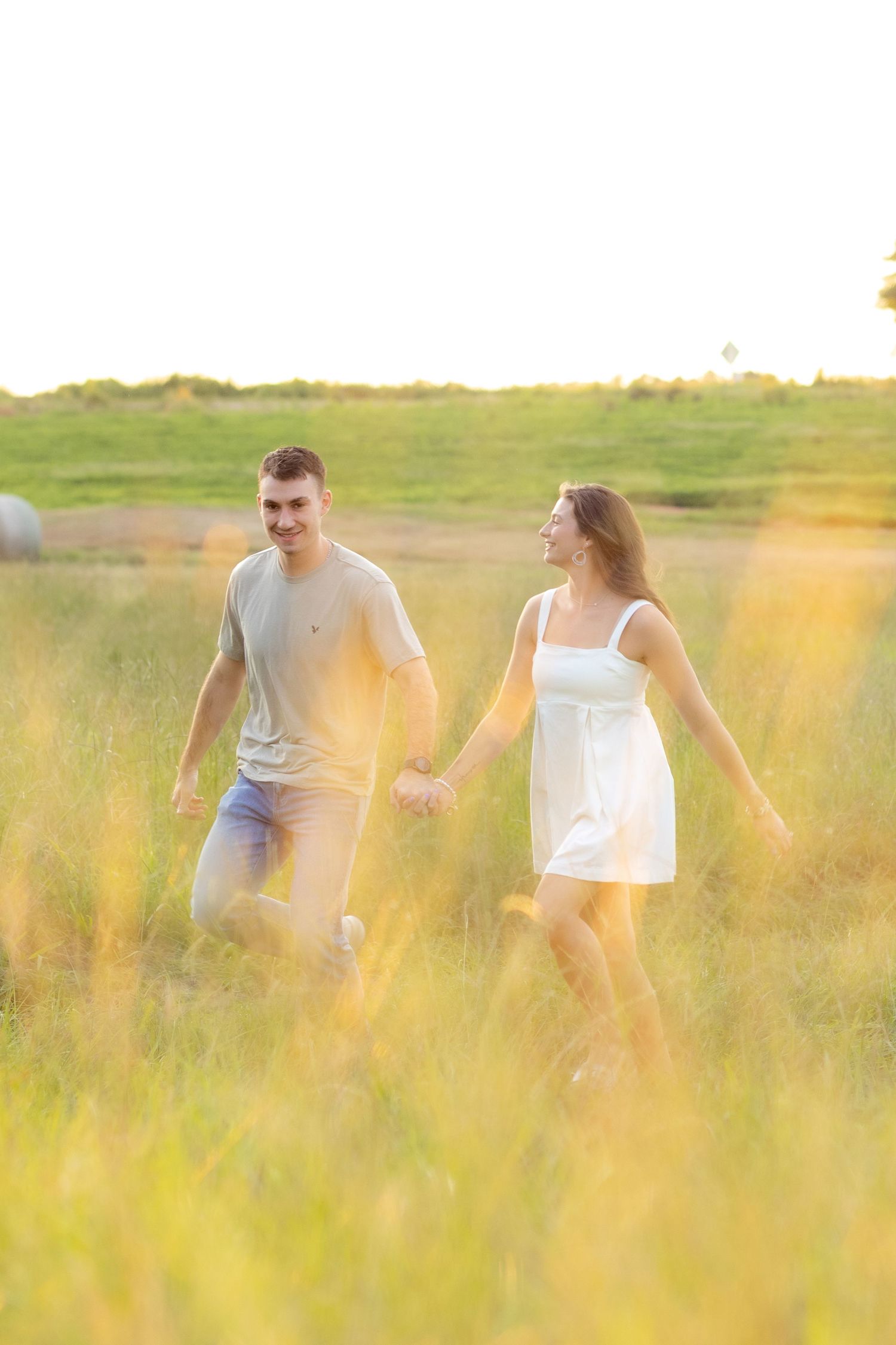 Couple photos in a field at sunset near Dothan, Alabama