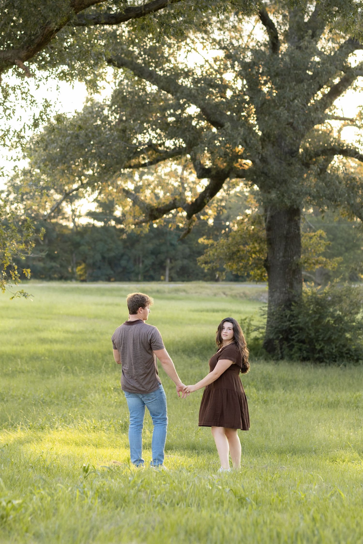 Family Pictures in a grass field at sunset near Dothan, Alabama