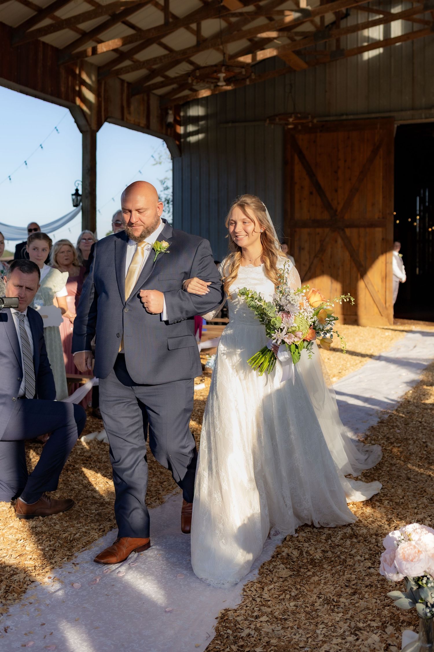 Father and bride walking down the aisle at Dalrymple Farms Enterprise, Alabama