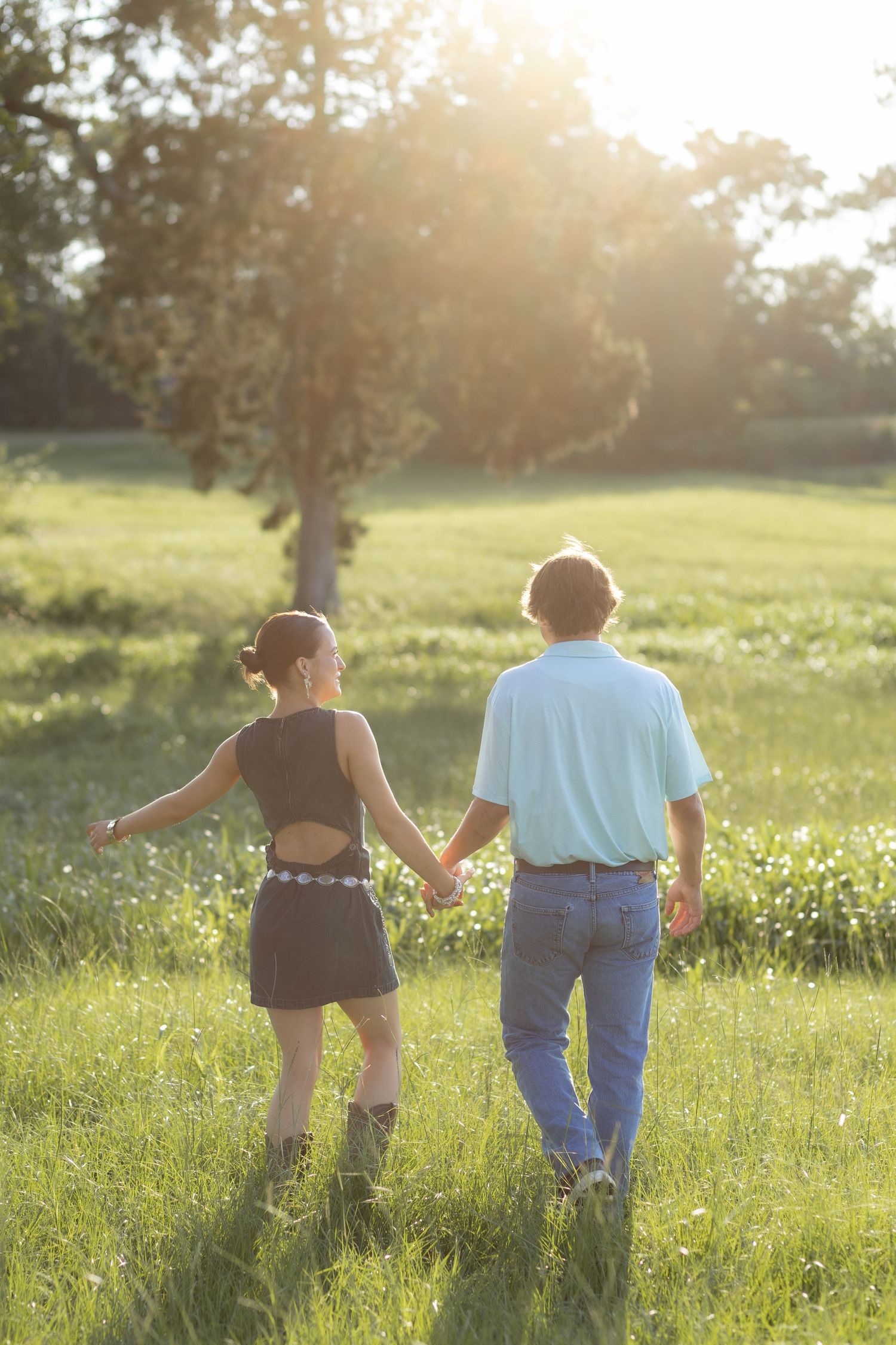 Romantic Couples photos in a tall grass field at sunset near Dothan, Alabama