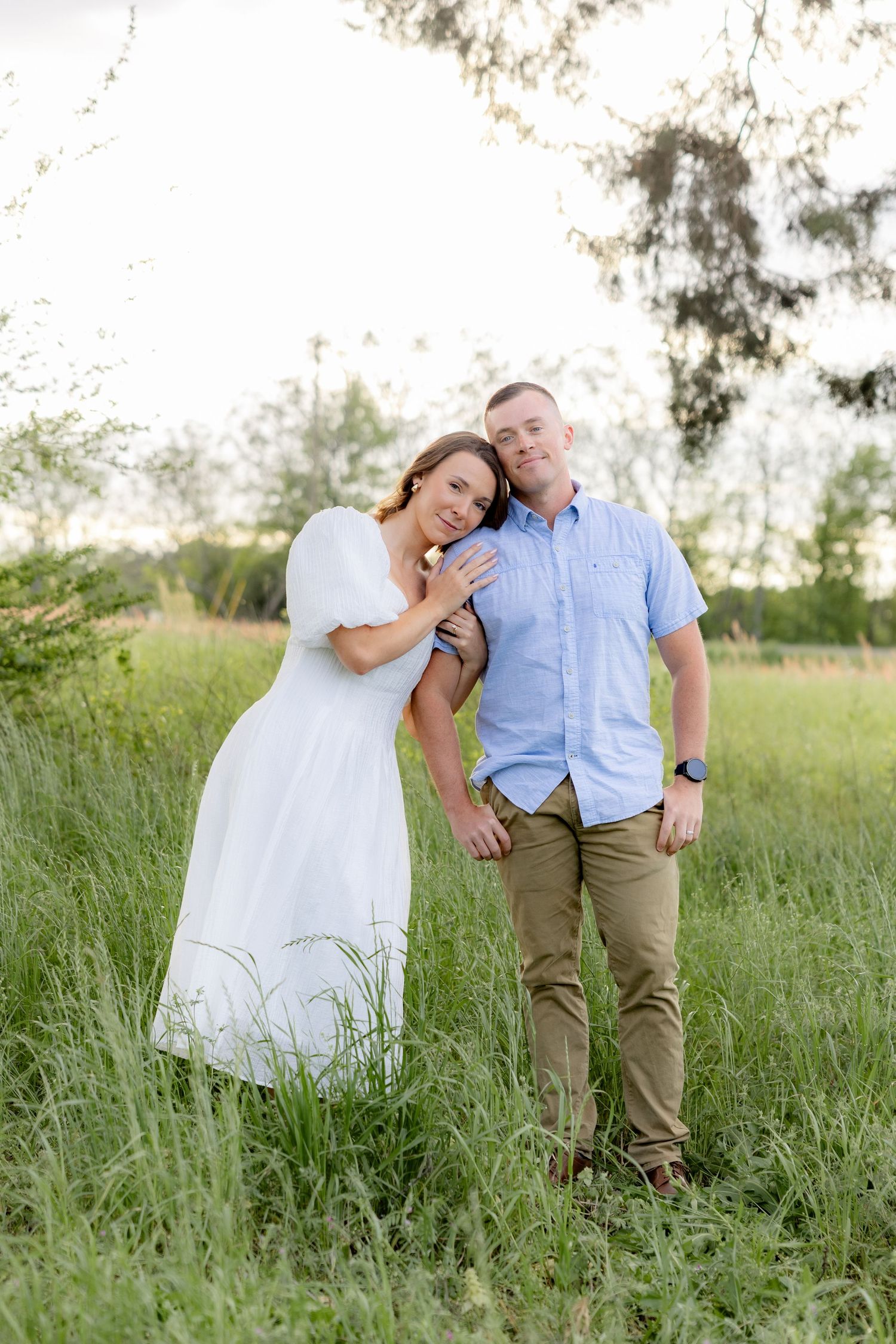 Storytelling romantic couple photos in a tall grass field at sunset in Dothan, Alabama
