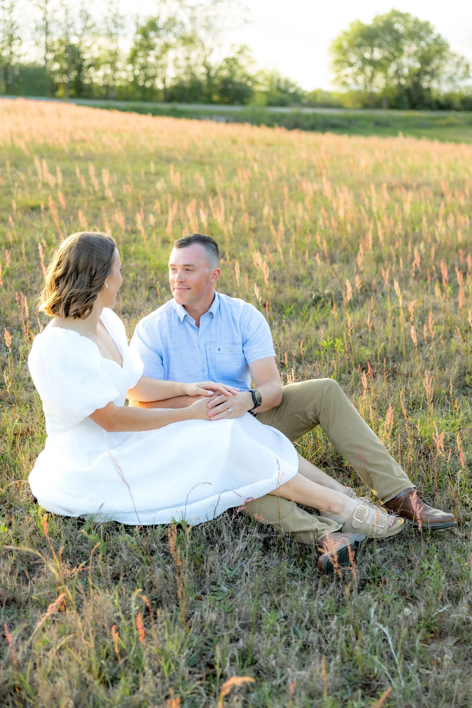 Romantic Couple session in a grass field at sunset near Dothan, Alabama