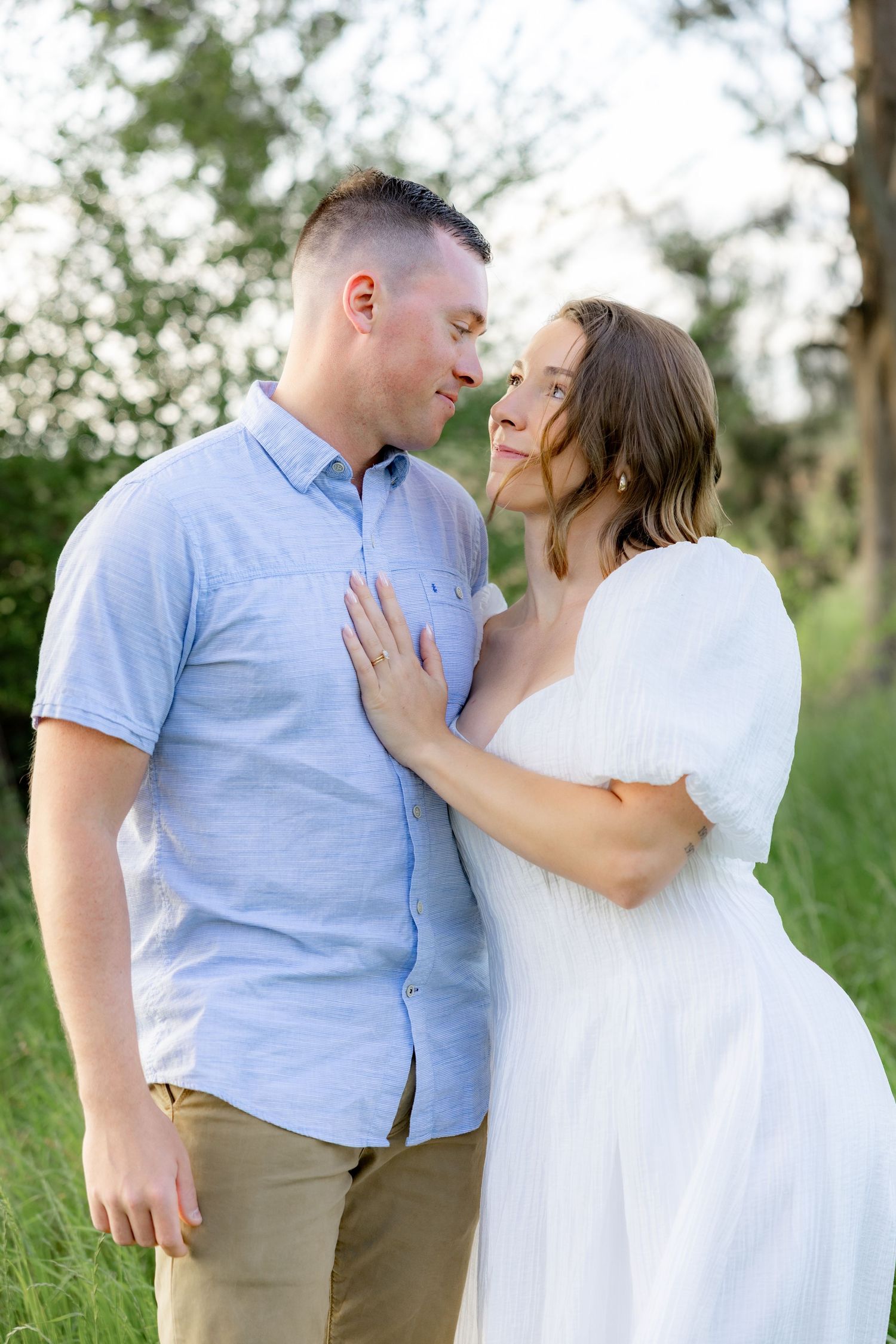Storytelling romantic couple photos in a tall grass field at sunset in Dothan, Alabama