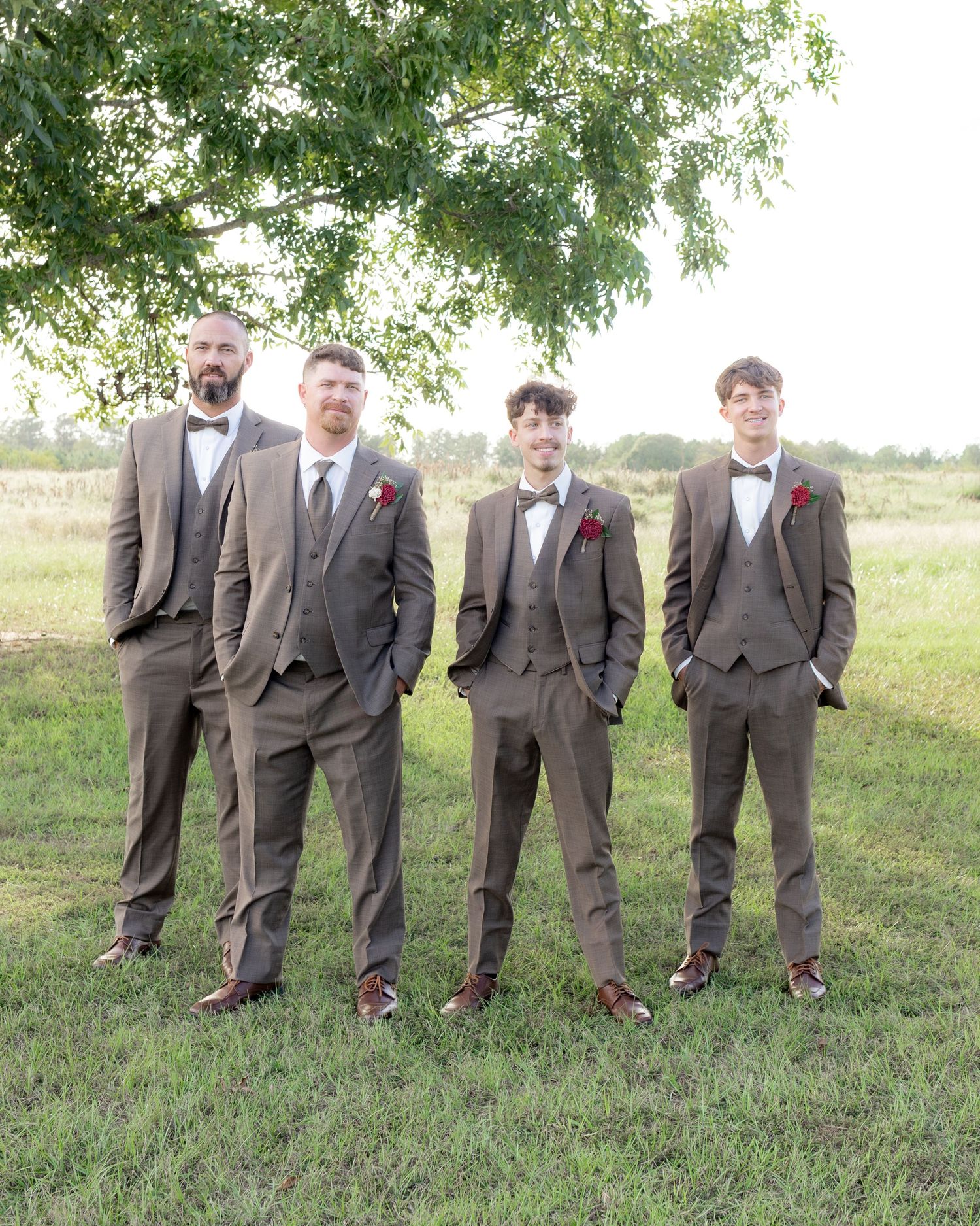 Bridal party posing in a field at sunset at Hilltop Acres Wicksburg, Alabama