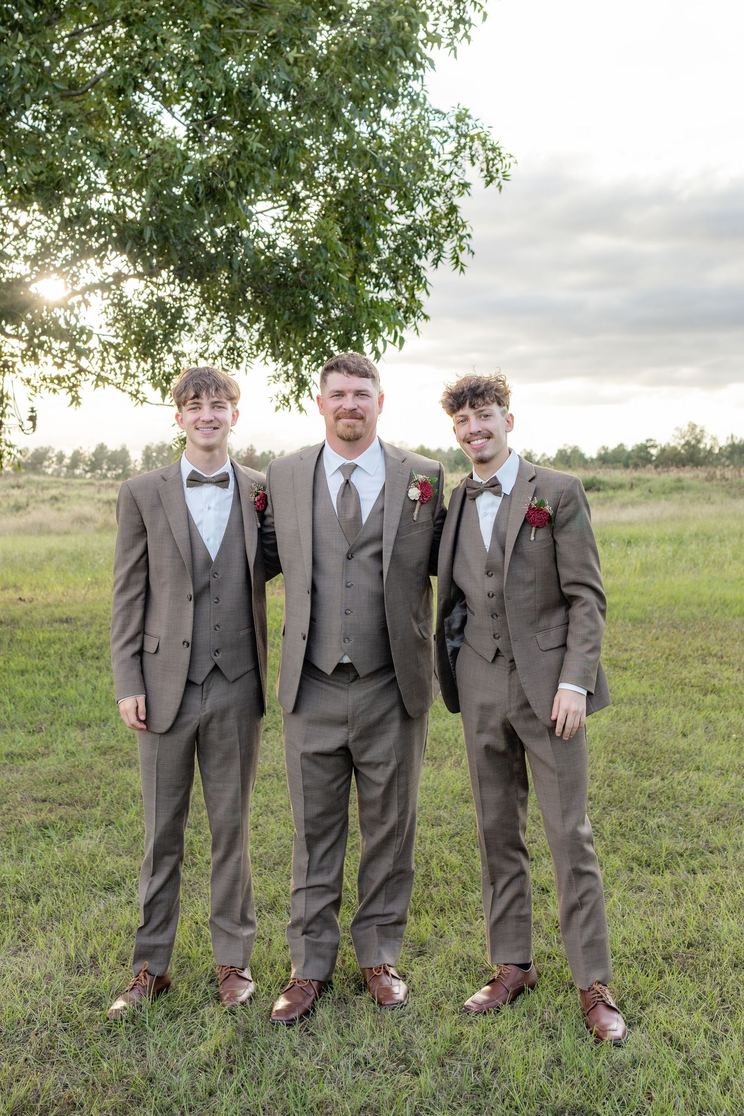 Groom with his sons on his wedding day at Hilltop Acres Wicksburg, Alabama