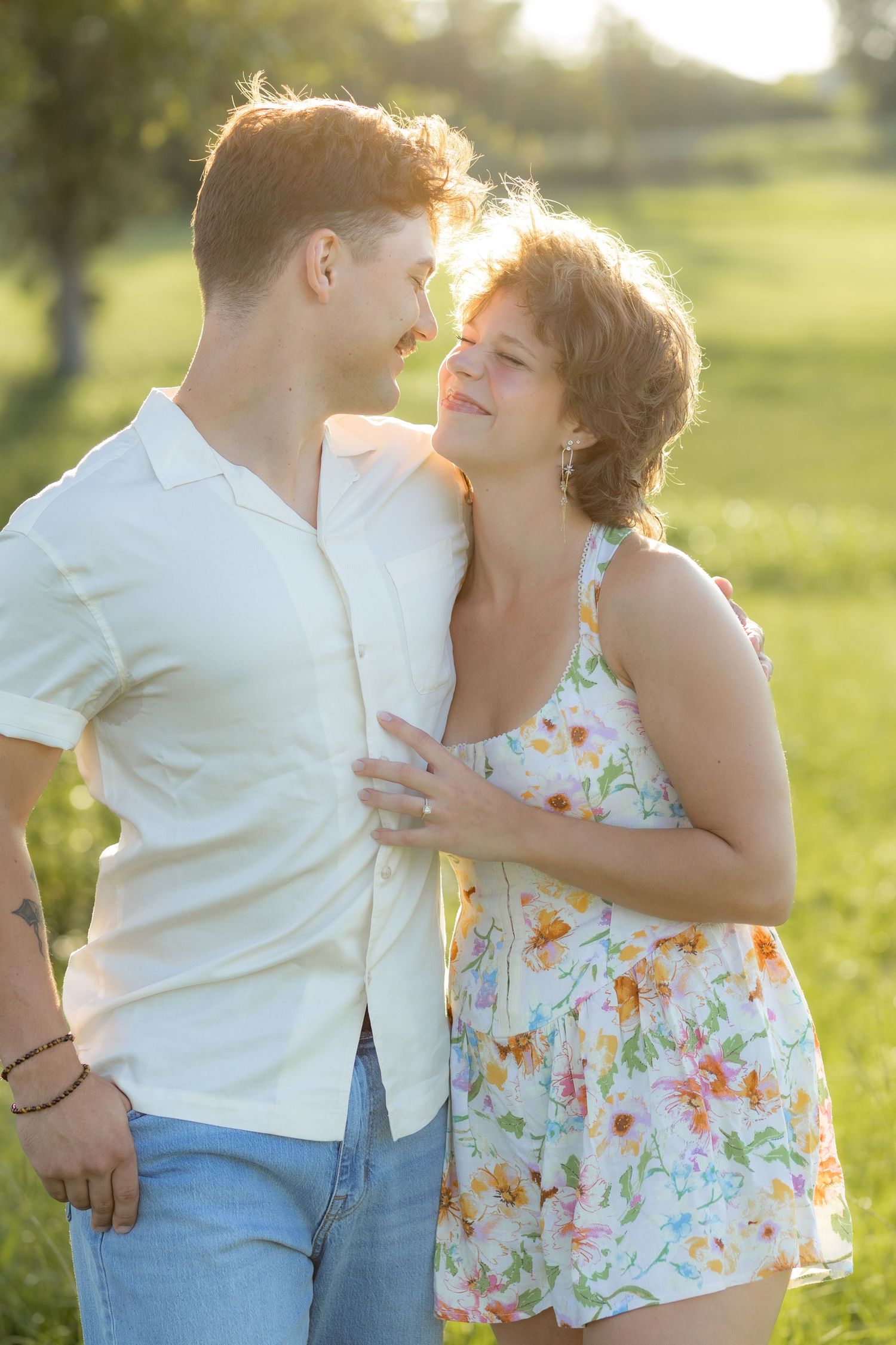 Romantic Couples photos in a tall grass field at sunset near Dothan, Alabama