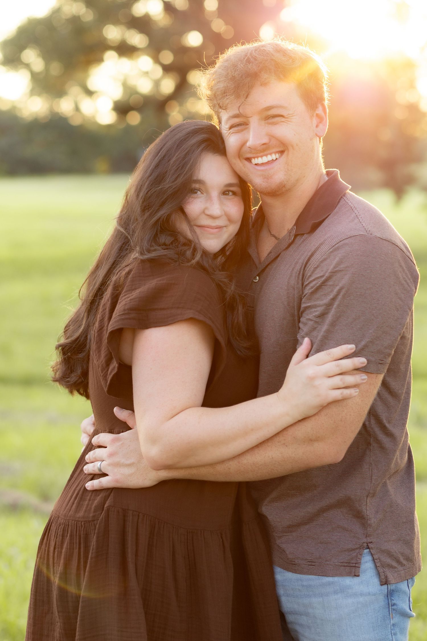 Family Pictures in a grass field at sunset near Dothan, Alabama