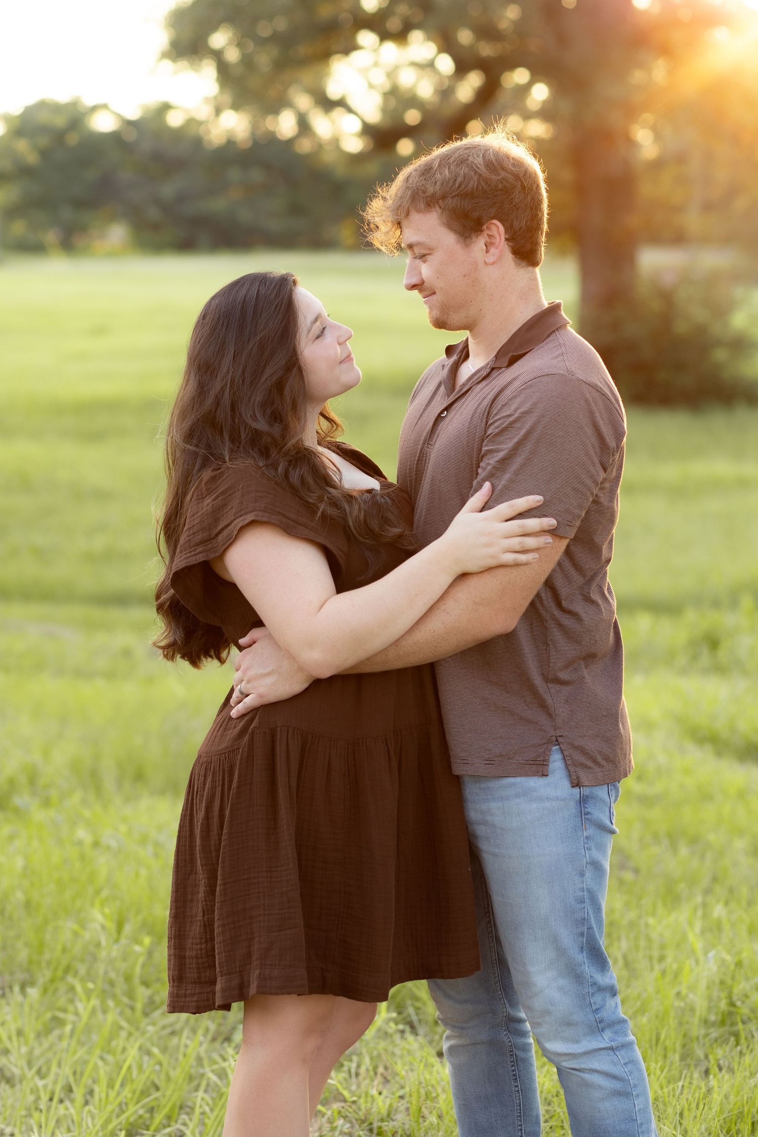 Family Pictures in a grass field at sunset near Dothan, Alabama