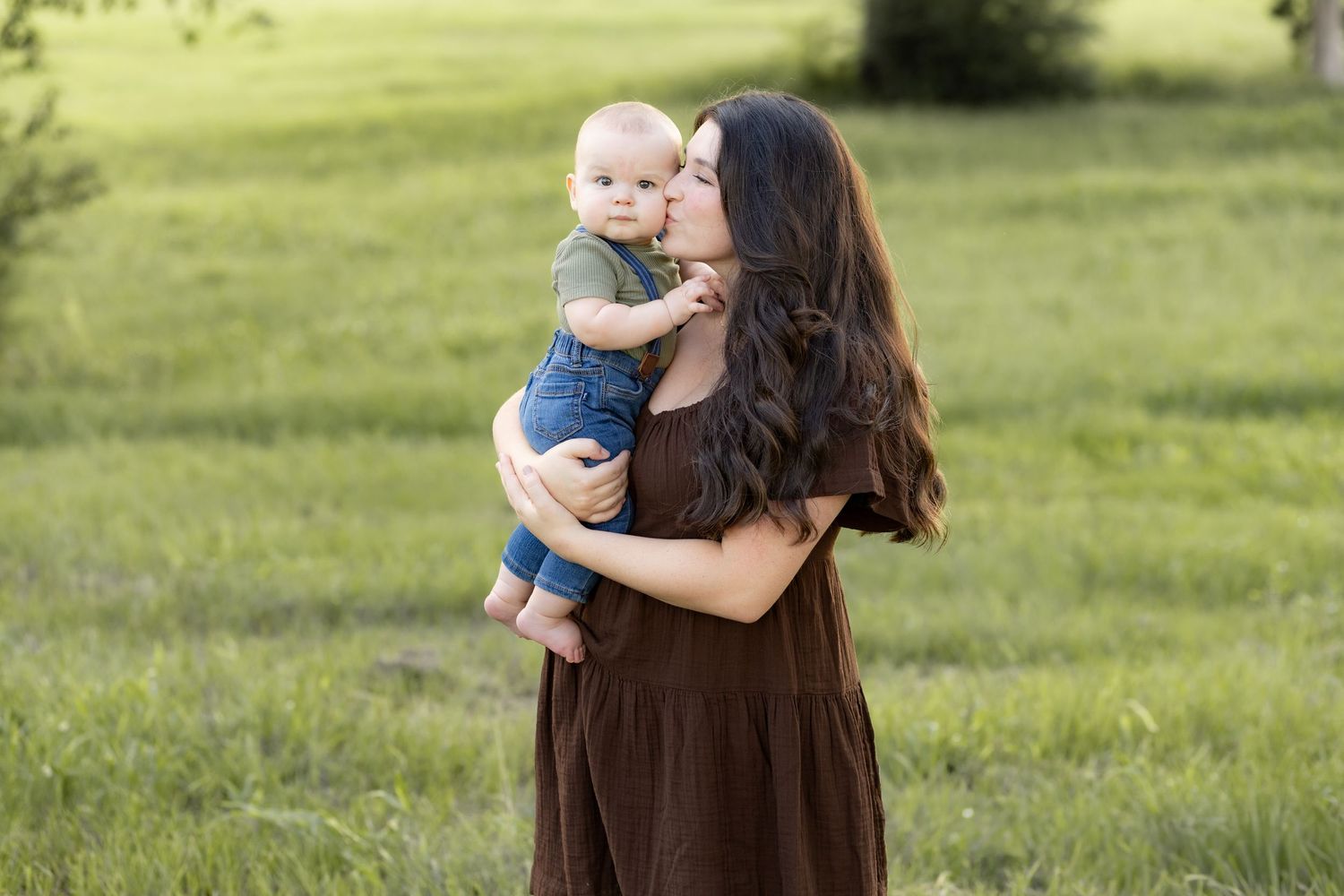 Family Pictures in a grass field at sunset near Dothan, Alabama