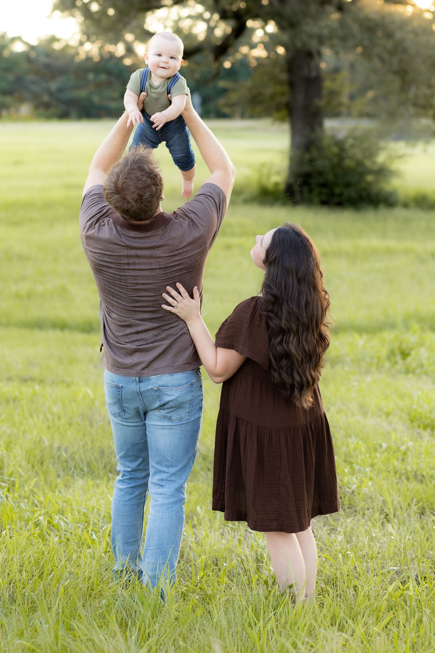 Family Pictures in a grass field at sunset near Dothan, Alabama