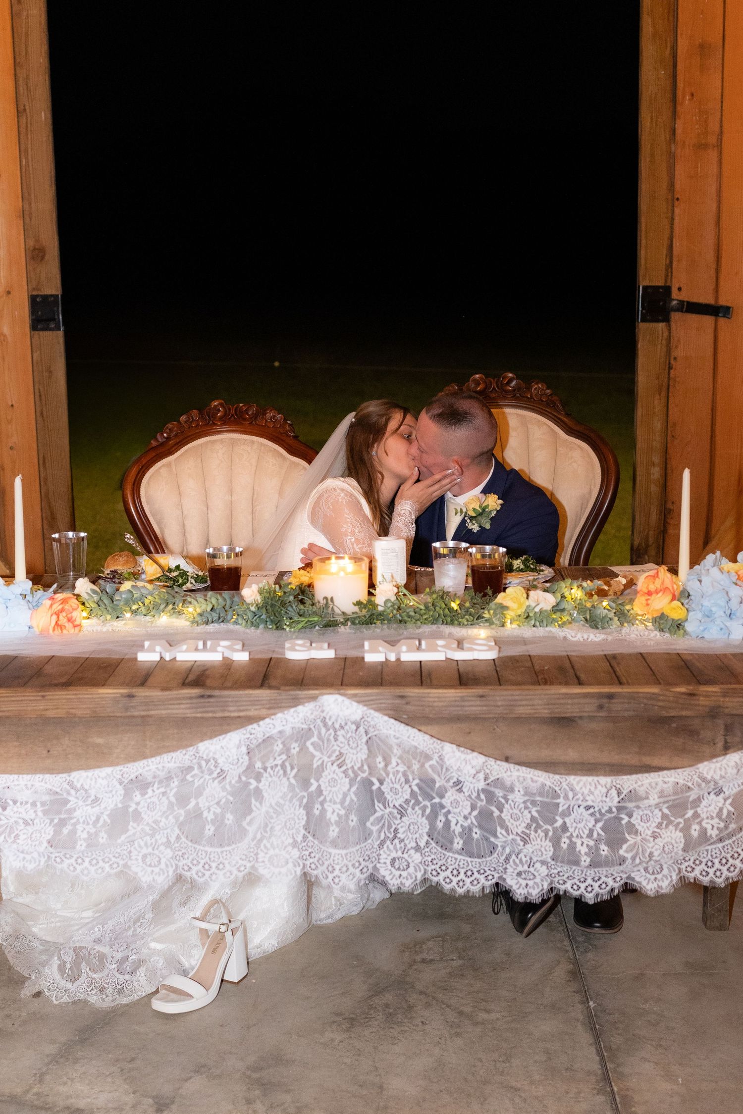 Bride and groom pose for a photo at their reception at Dalrymple Farms Enterprise, Alabama