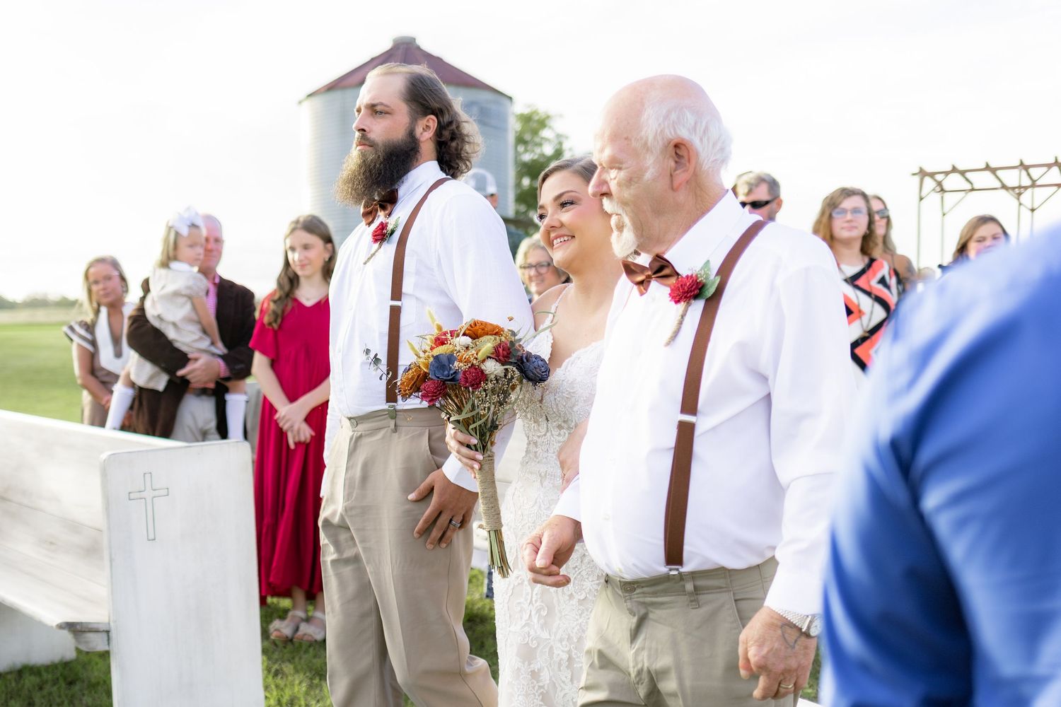 Father and brother giving the bride away at a wedding at Hilltop Acres Wicksburg, Alabama