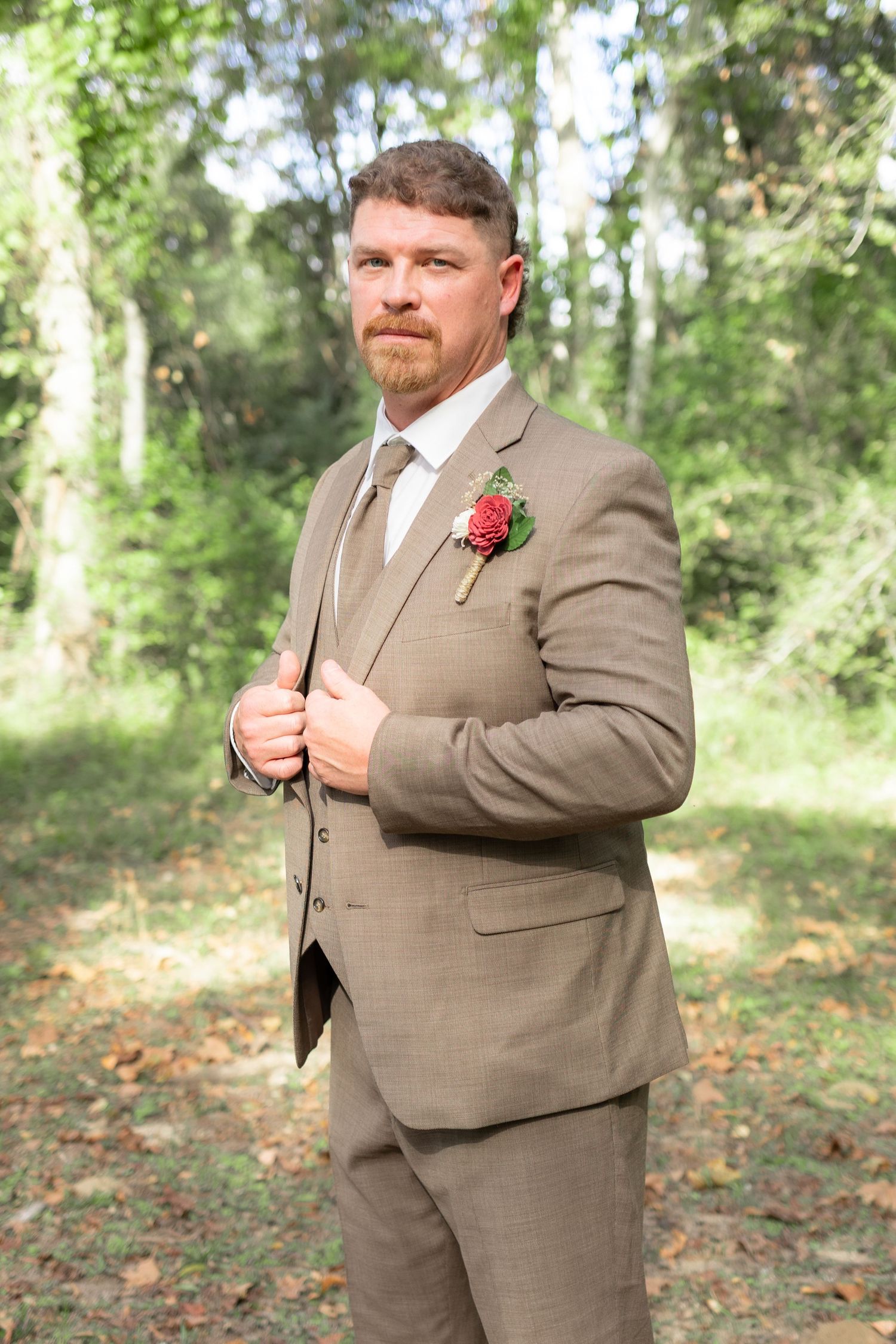 Groom getting ready for his wedding at Hilltop Acres Wicksburg, Alabama
