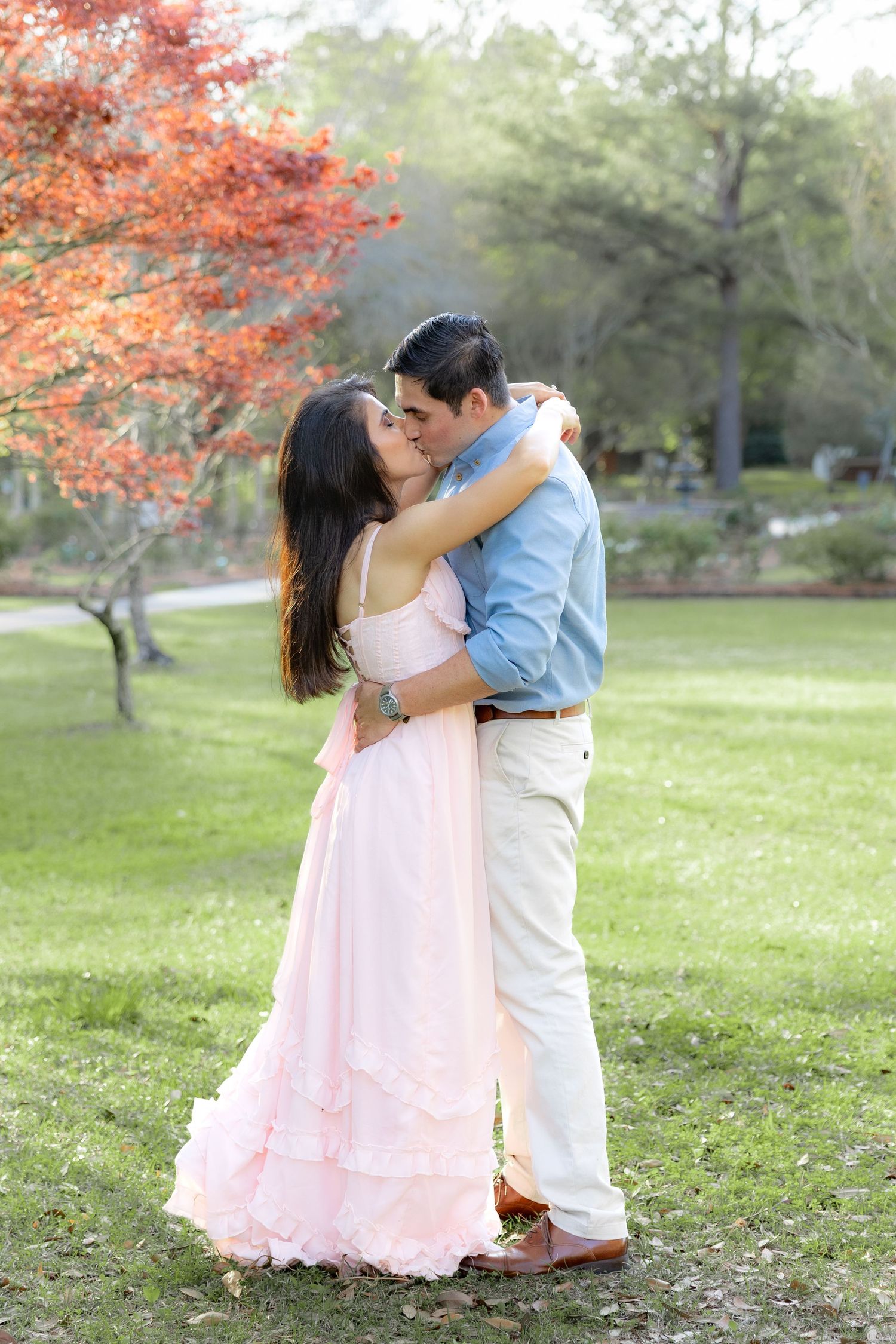 Couple hugging each other at Dothan Area Botanical Gardens