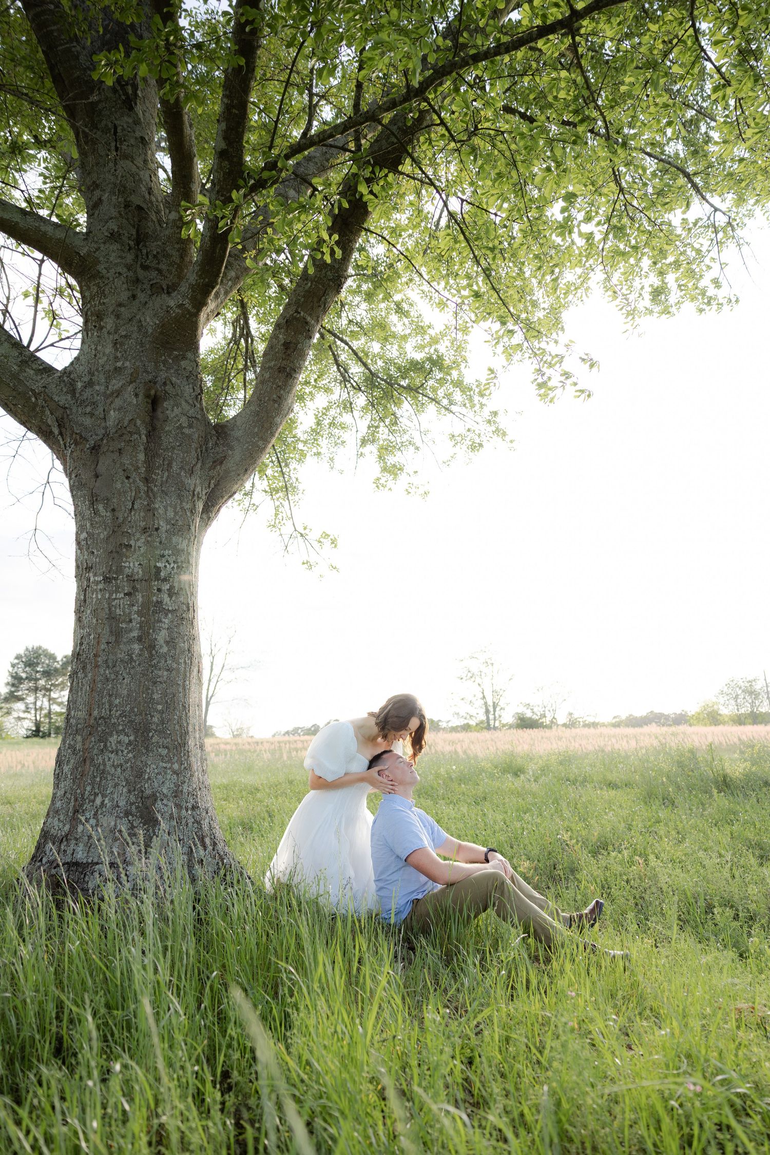 Storytelling romantic couple photos in a tall grass field at sunset in Dothan, Alabama