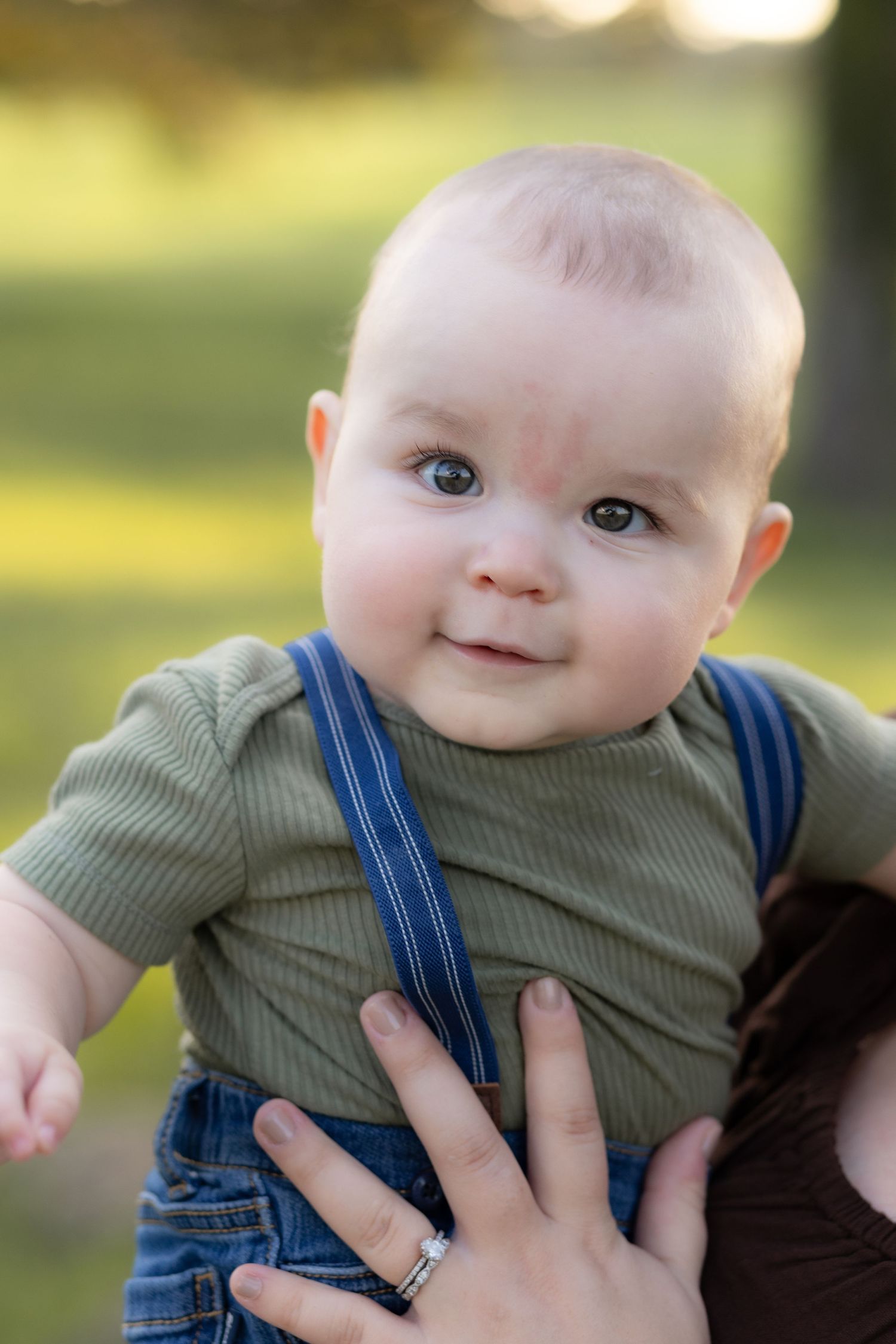 Family Pictures in a grass field at sunset near Dothan, Alabama