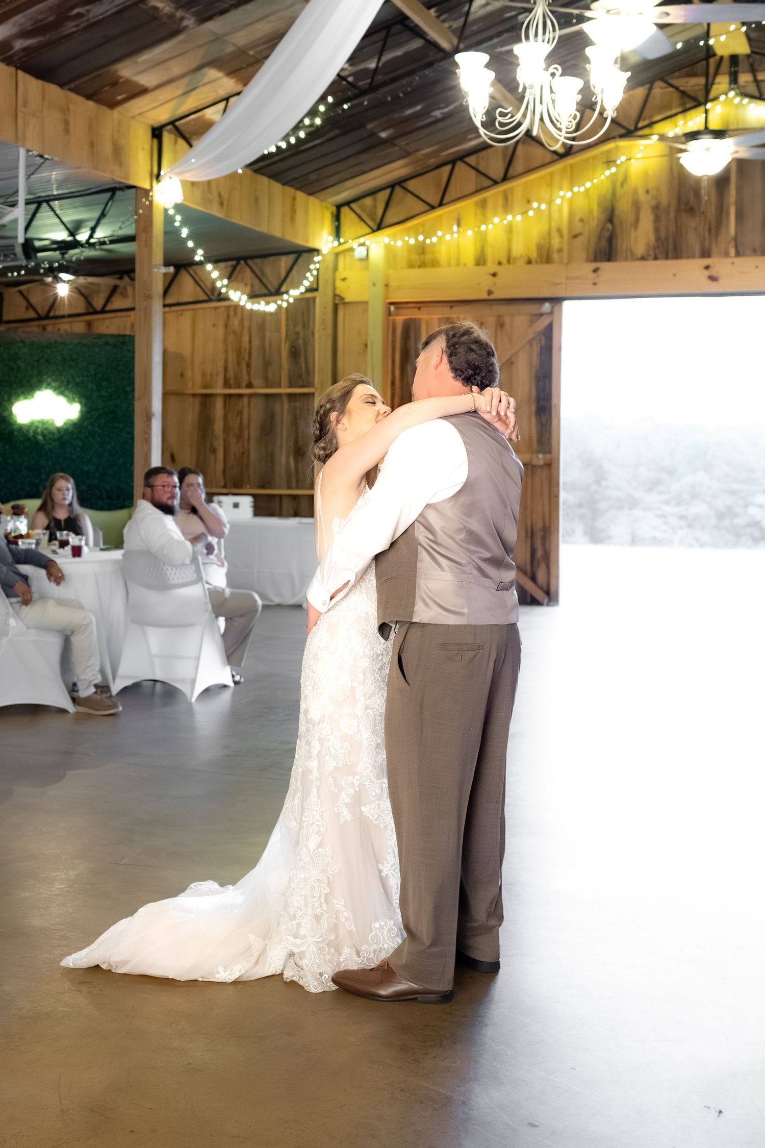 Bride and groom dance at a wedding at Hilltop Acres Wicksburg, Alabama