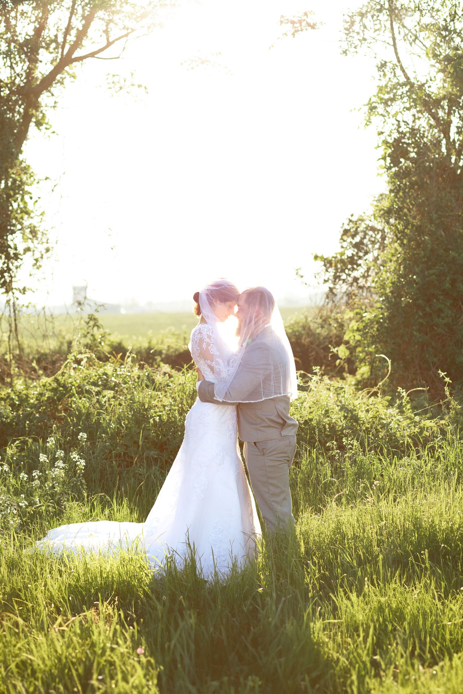 Bride and groom hugging on their wedding day in Dothan, Alabama