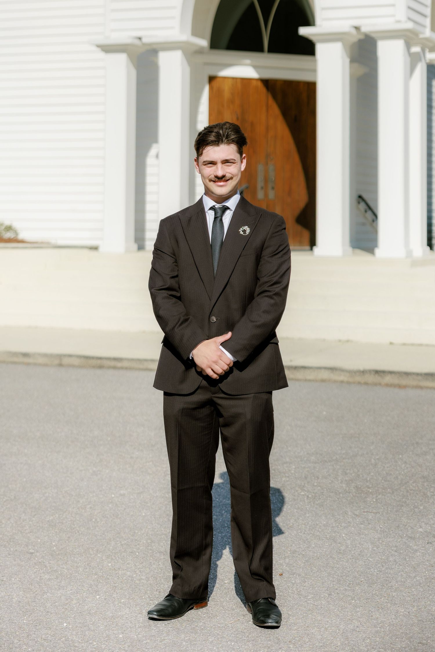 Wedding Groom Portraits at Saint Francis at The Point Anglican Church Fairhope, Alabama
