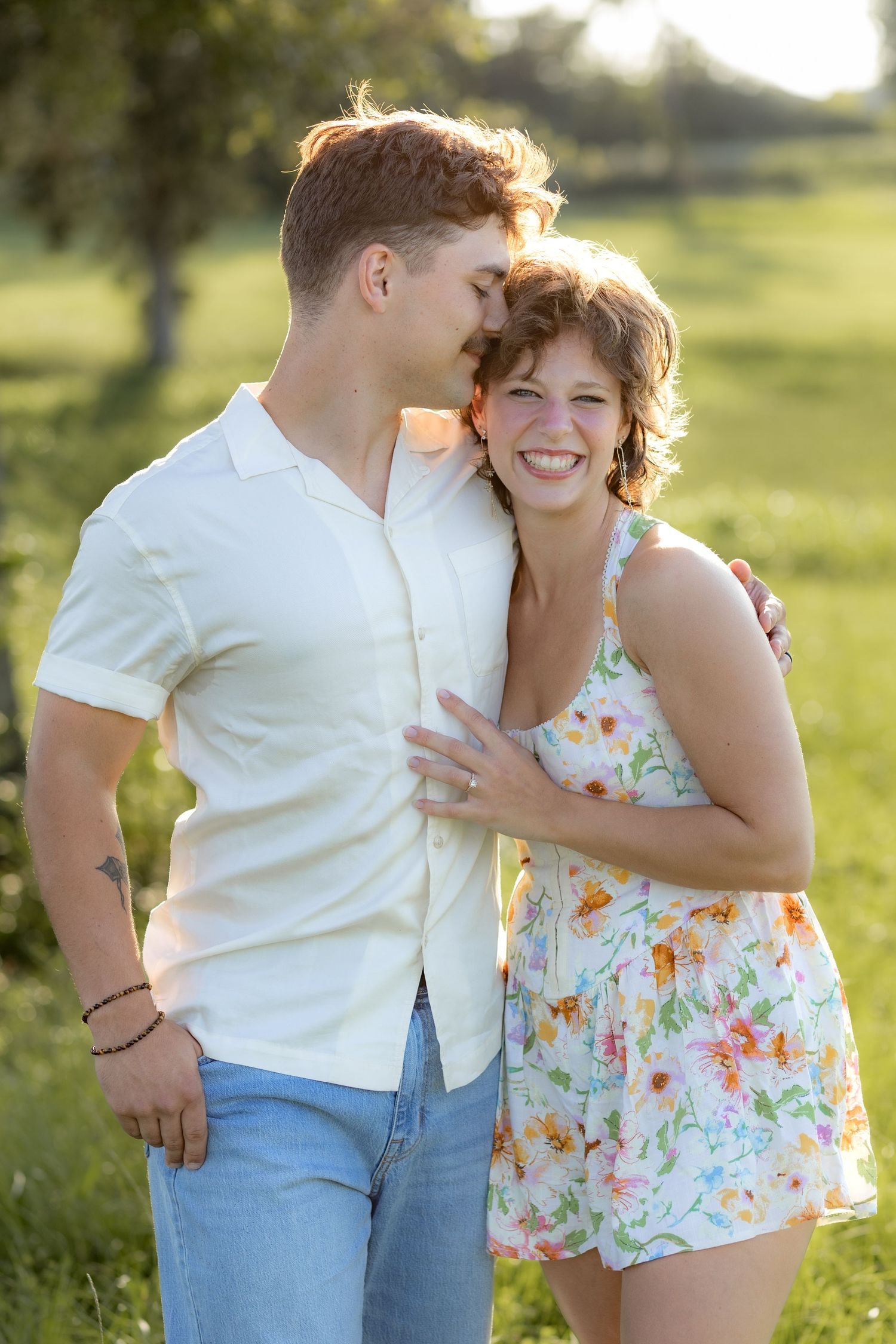 Romantic Couples photos in a tall grass field at sunset near Dothan, Alabama