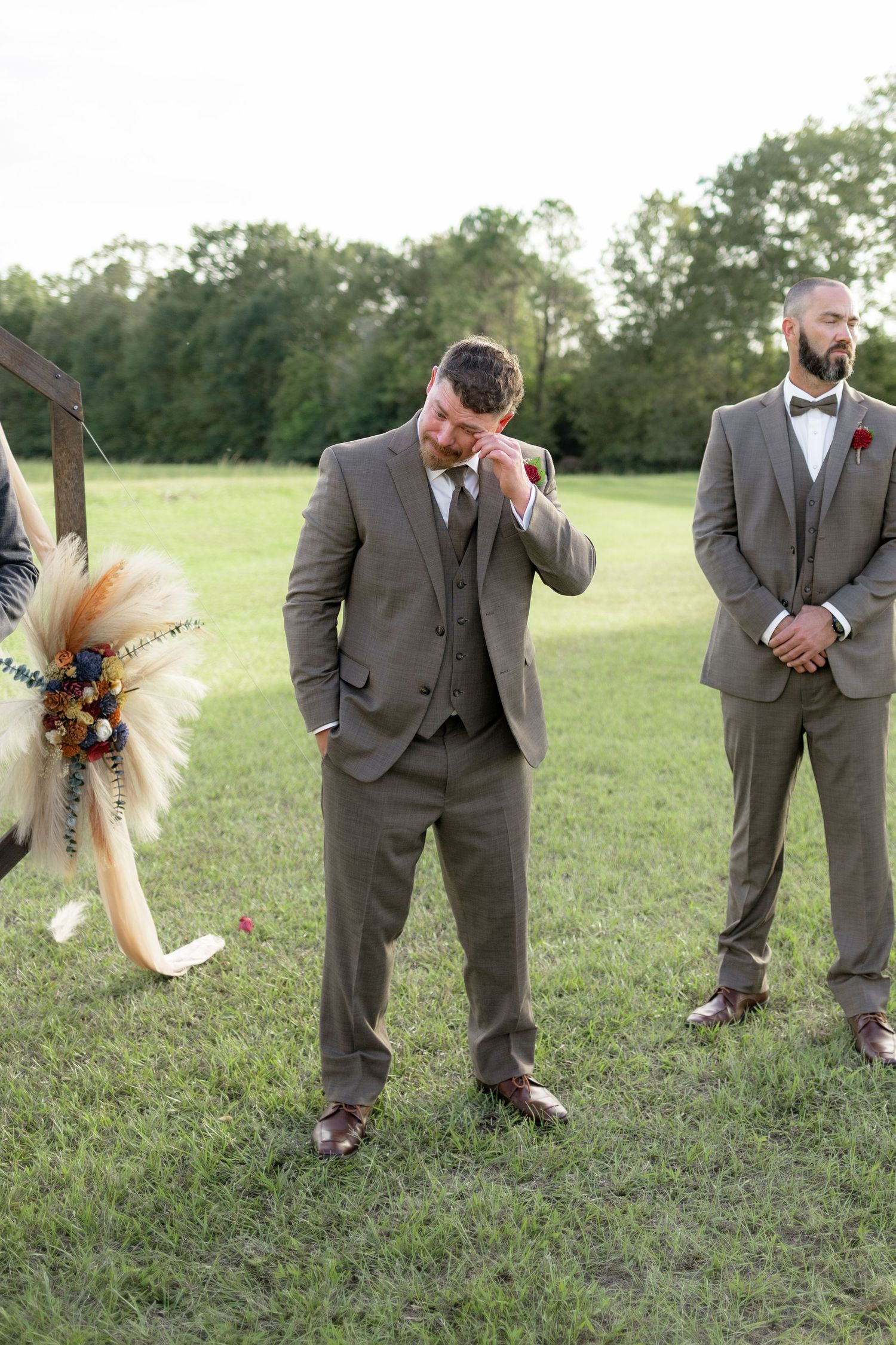 Groom crying at sight of bride at a wedding at Hilltop Acres Wicksburg, Alabama