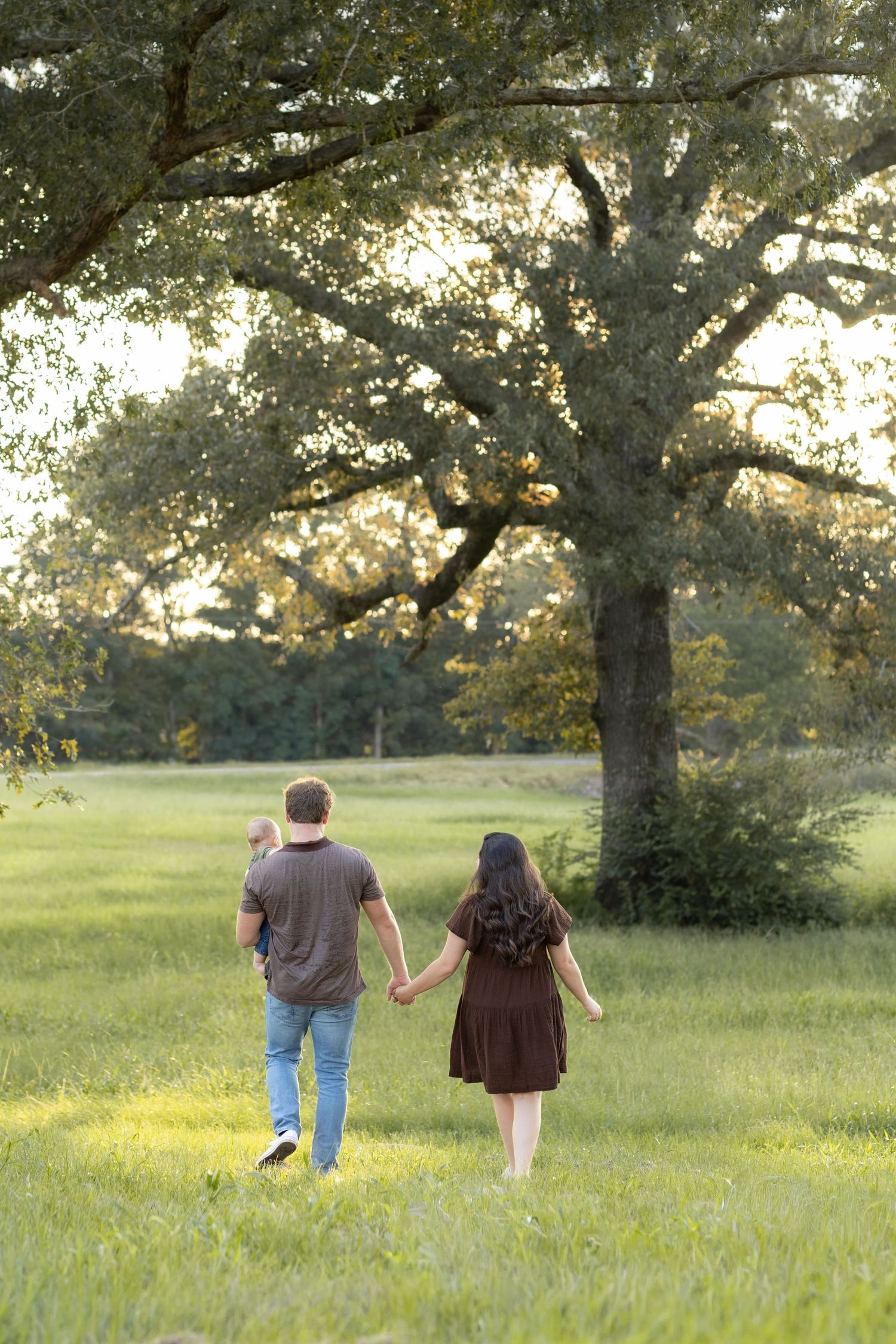 Family Pictures in a grass field at sunset near Dothan, Alabama