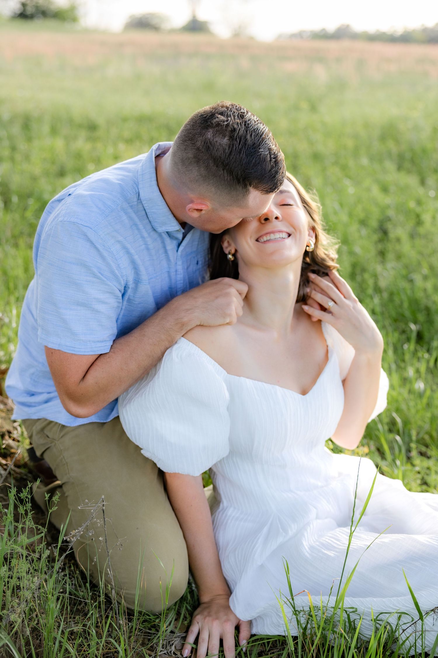 Storytelling romantic couple photos in a tall grass field at sunset in Dothan, Alabama