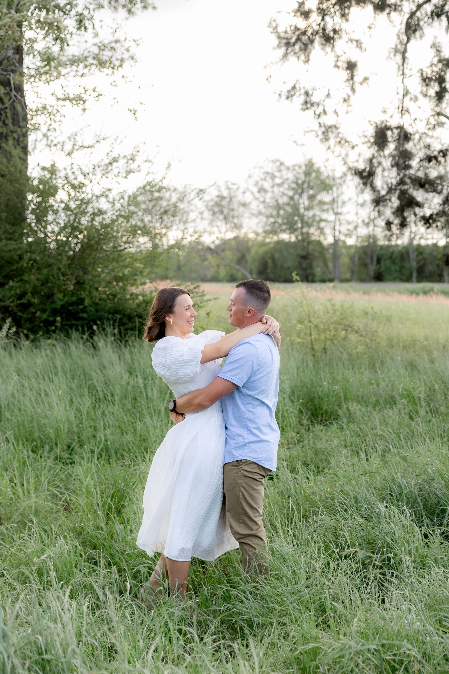 Storytelling romantic couple photos in a tall grass field at sunset in Dothan, Alabama