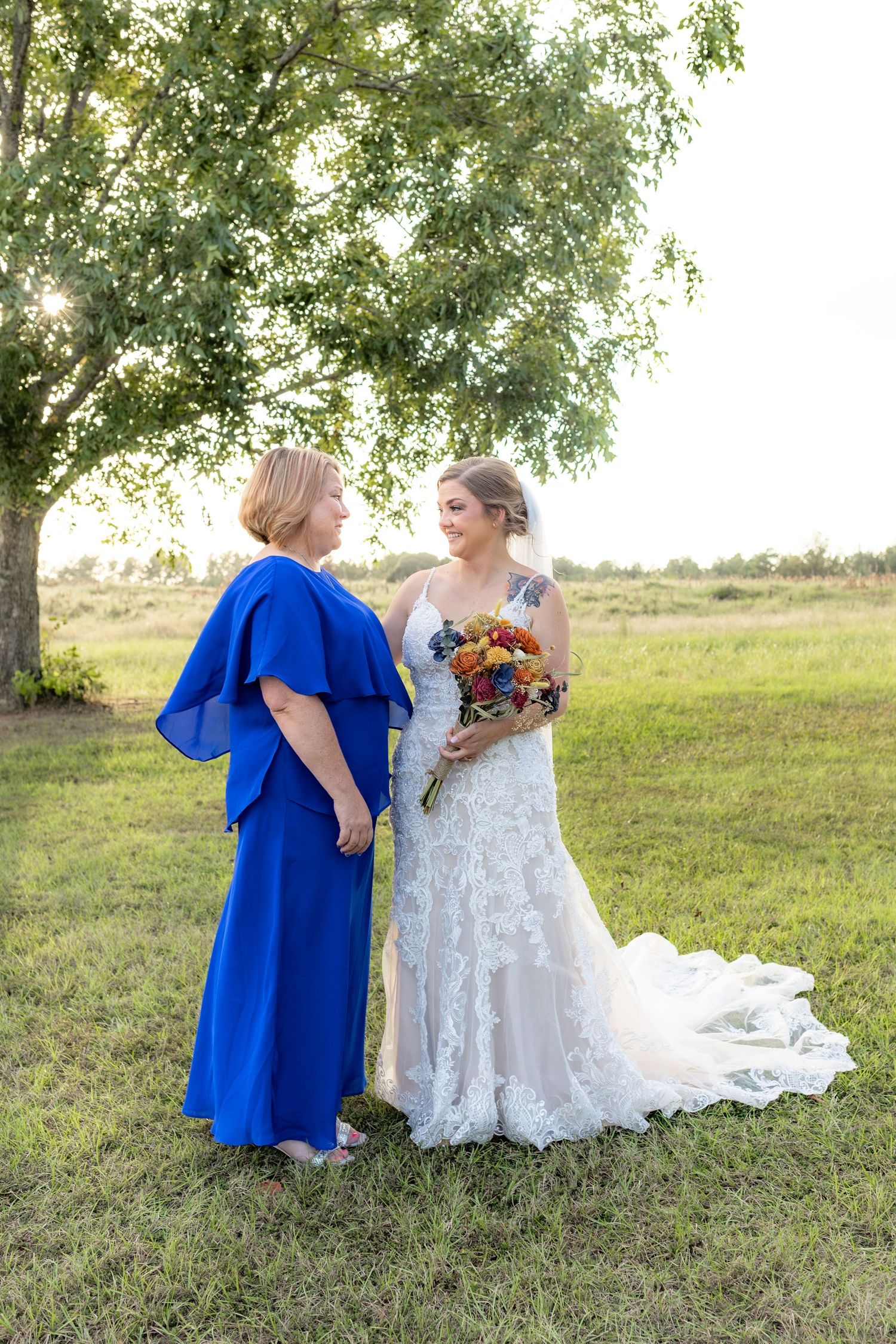 Bride and groom family portraits in a field at Hilltop Acres Wicksburg, Alabama