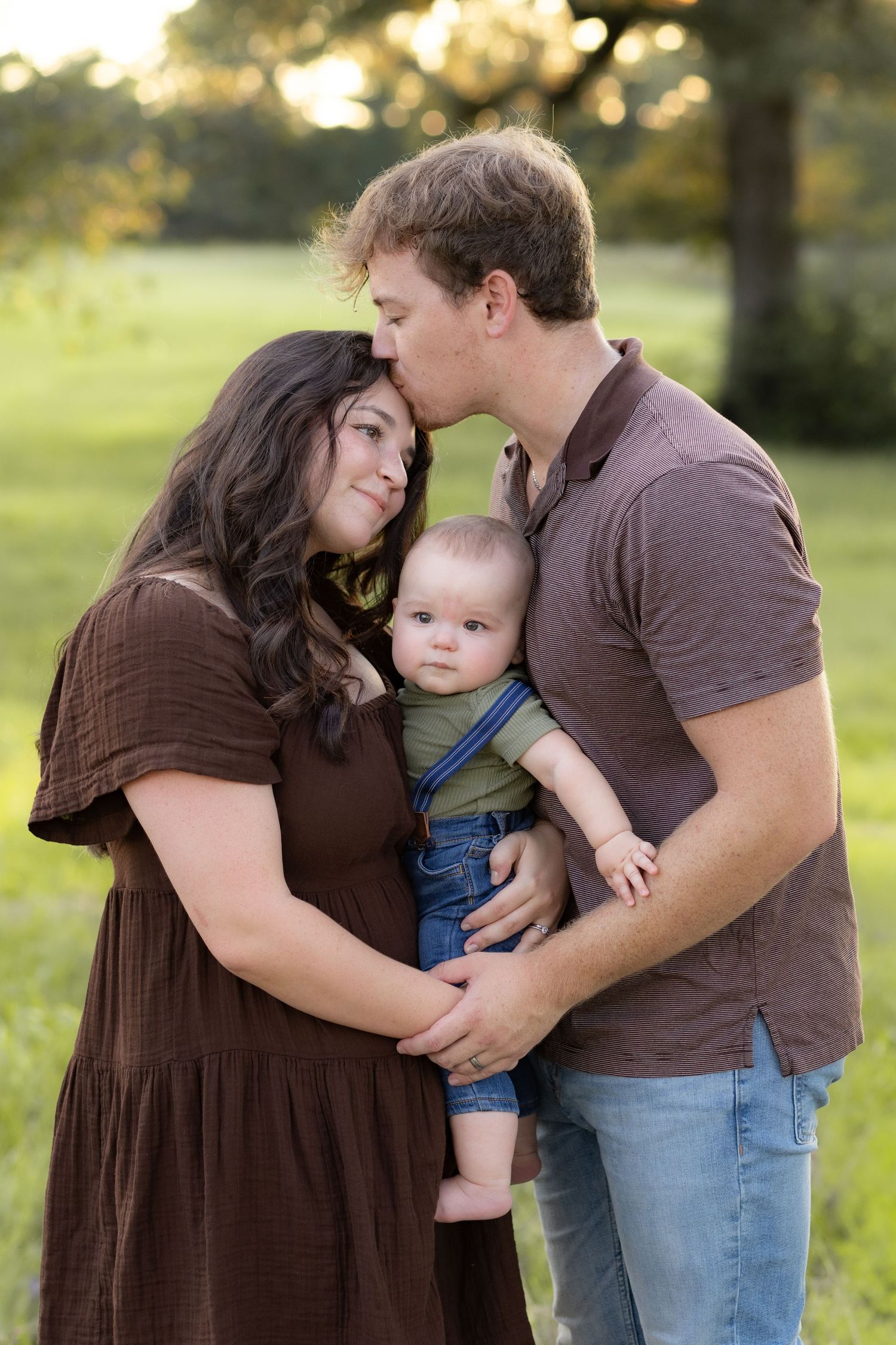 Family Pictures in a grass field at sunset near Dothan, Alabama