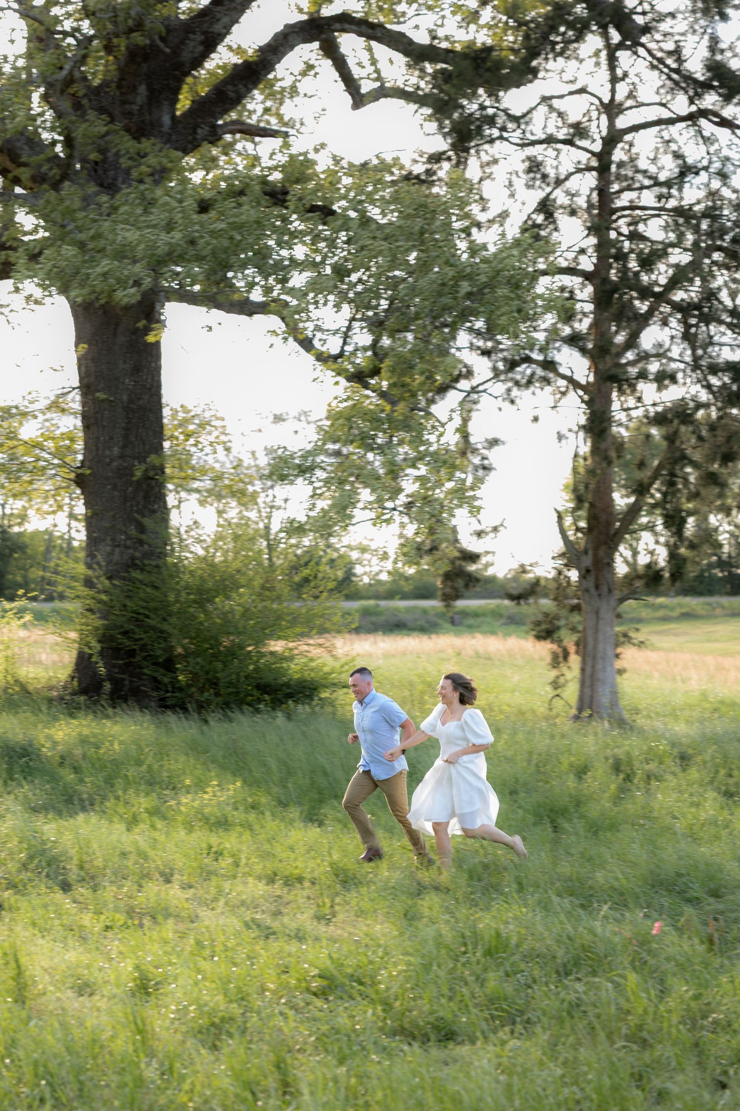 Storytelling romantic couple photos in a tall grass field at sunset in Dothan, Alabama