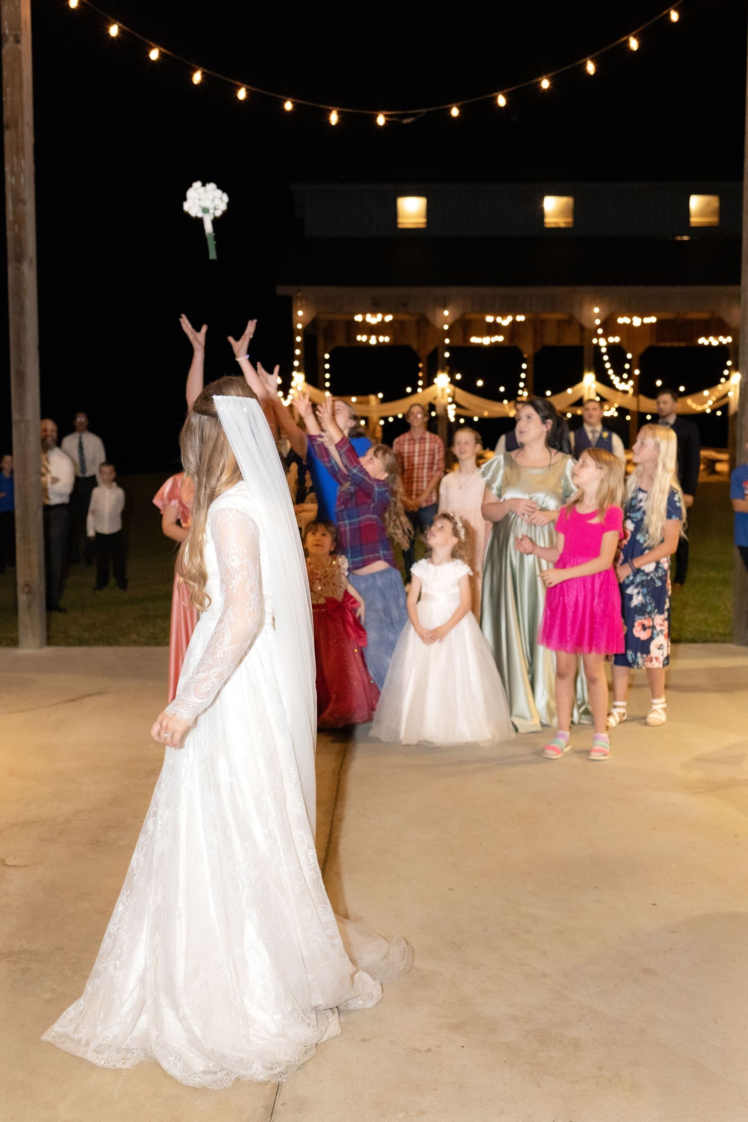 Bride throwing bouquet at Dalrymple Farms Enterprise, Alabama