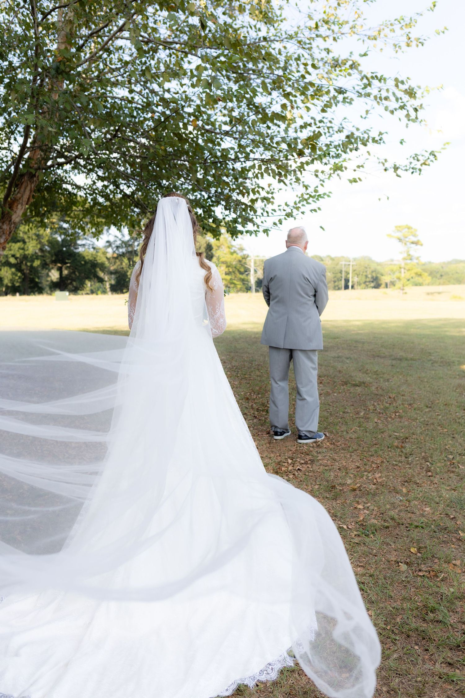 Bride and grandfather first look at wedding venue Dalrymple Farms Enterprise, Alabama