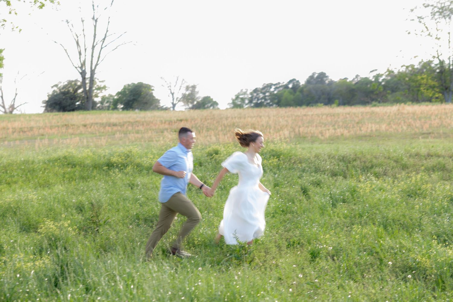 Storytelling romantic couple photos in a tall grass field at sunset in Dothan, Alabama