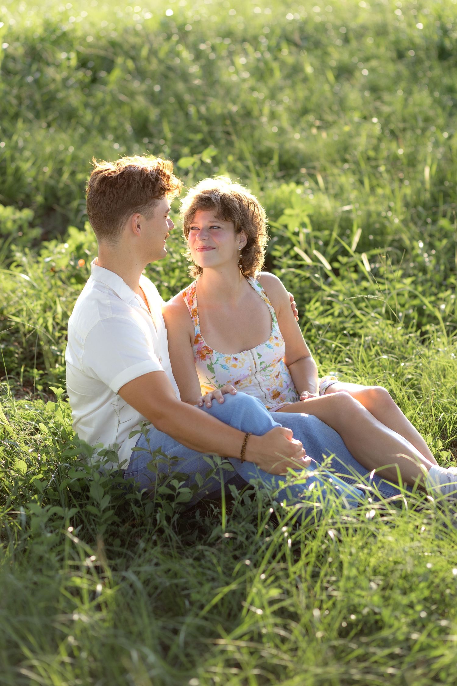 Romantic Couples photos in a tall grass field at sunset near Dothan, Alabama