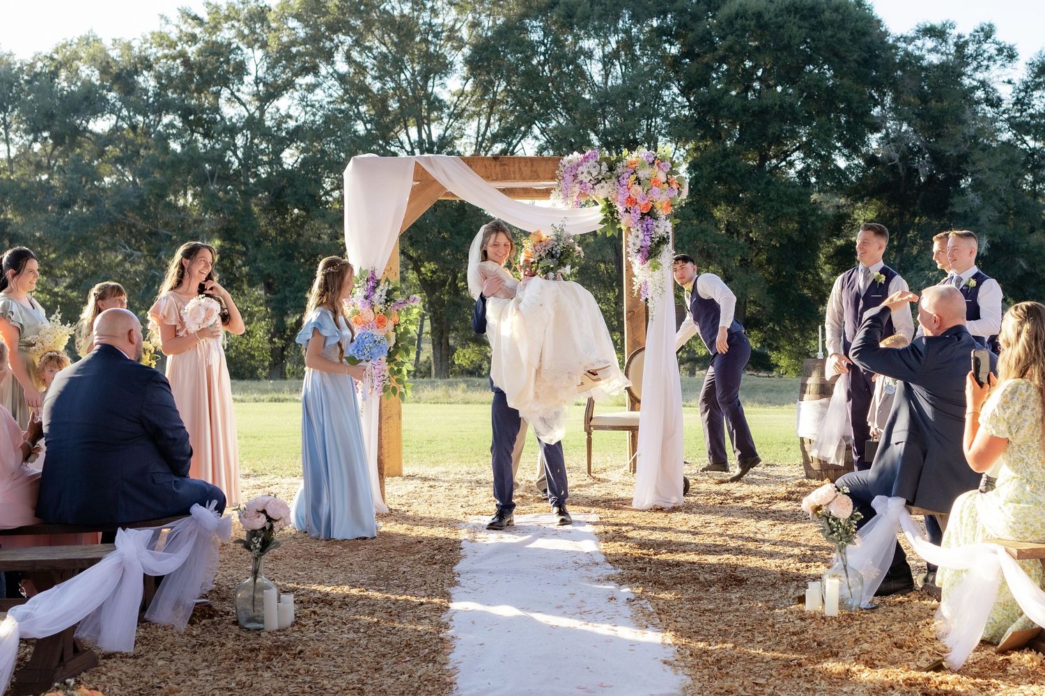 Couple running back up the aisle after getting married at Dalrymple Farms Enterprise, Alabama