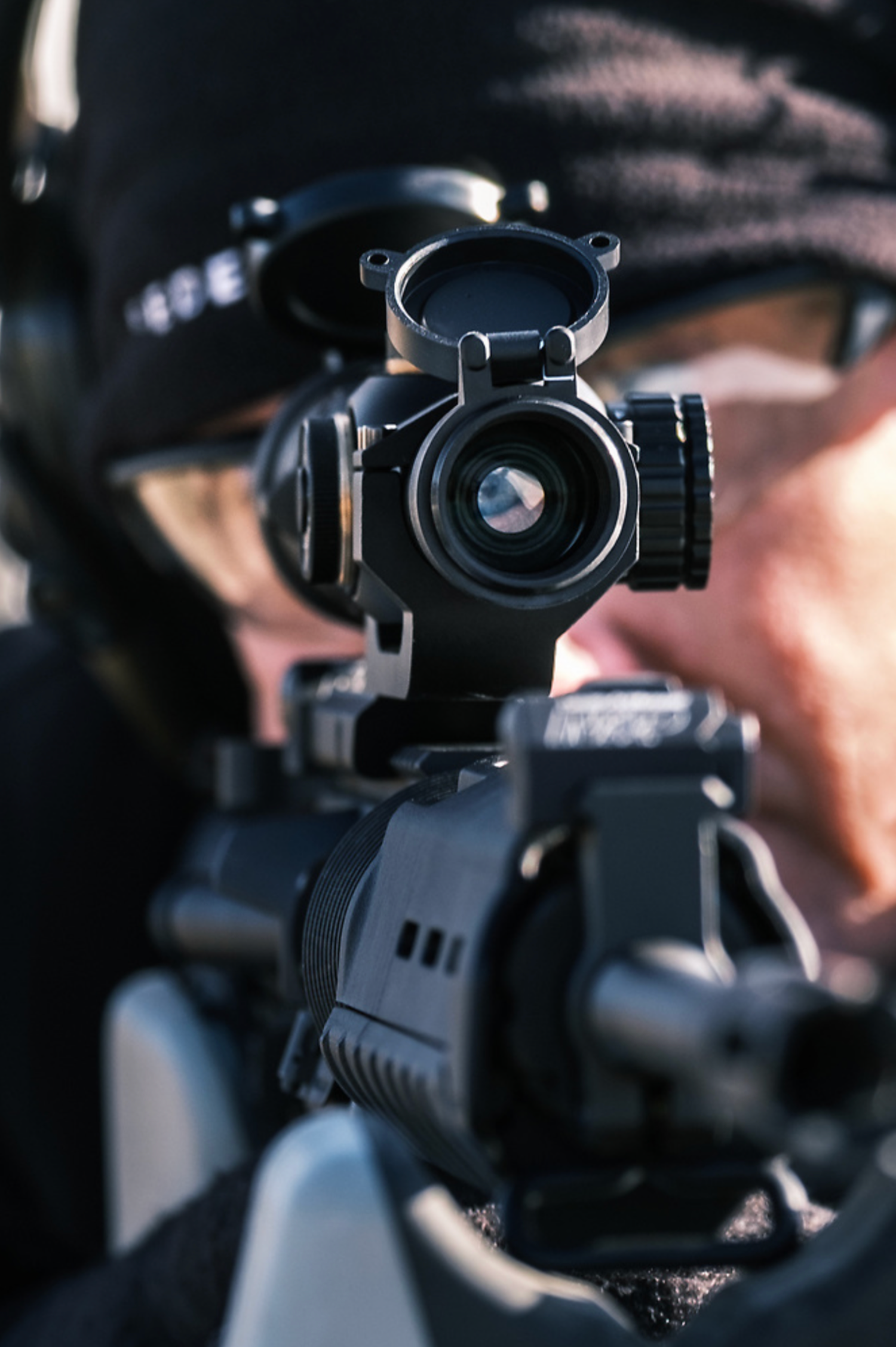 Close-up detail of a rifle scope or hunting optics.
