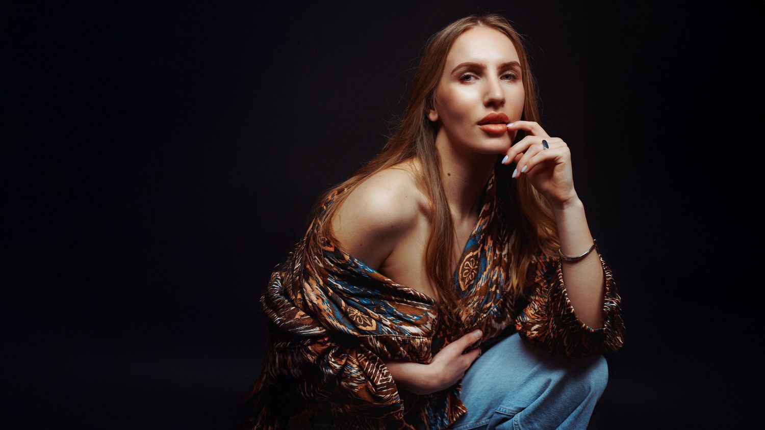 Six artistic portrait photographs arranged in a horizontal row against dark backgrounds.