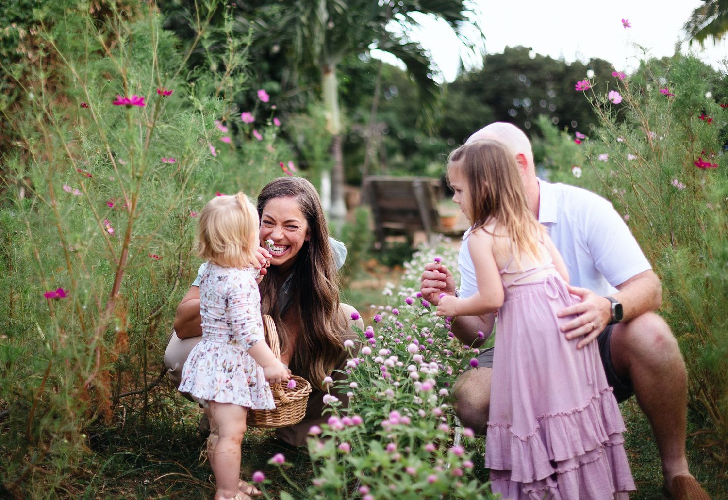 Family photography in a garden in Hawaii