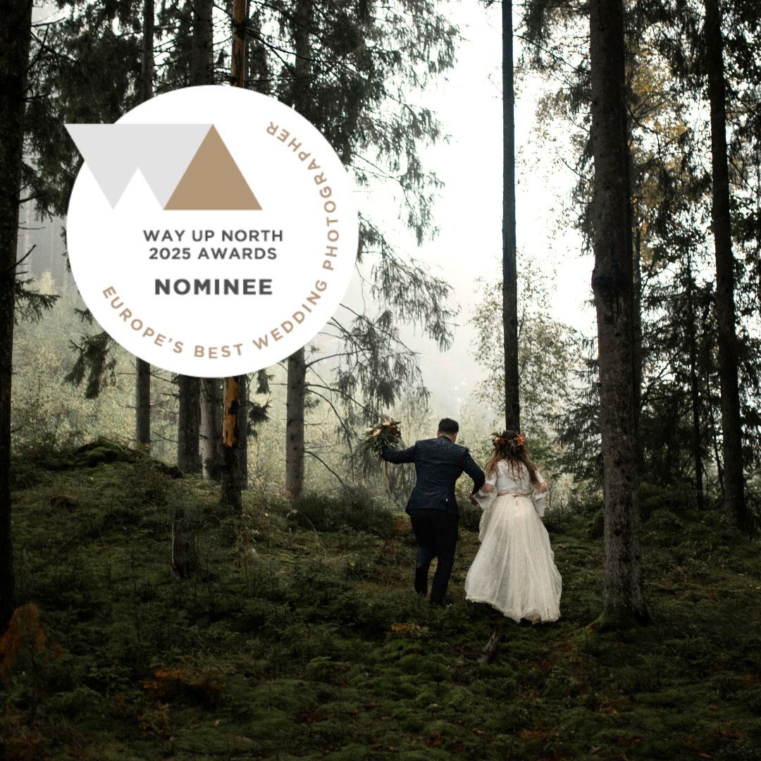 Couple walks hand-in-hand through misty forest in wedding attire, Way Up North 2025 Awards Europe's Best Wedding Photo Nominee.