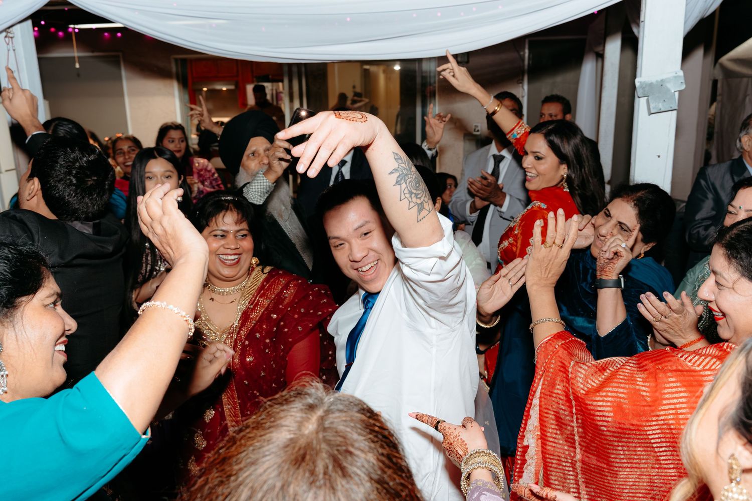 Sacramento engagement party where guests dance at wedding event
