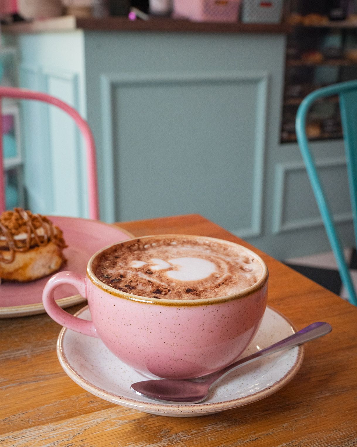 Close-up of a coffee in a pink cup at cinnammmm cafe
