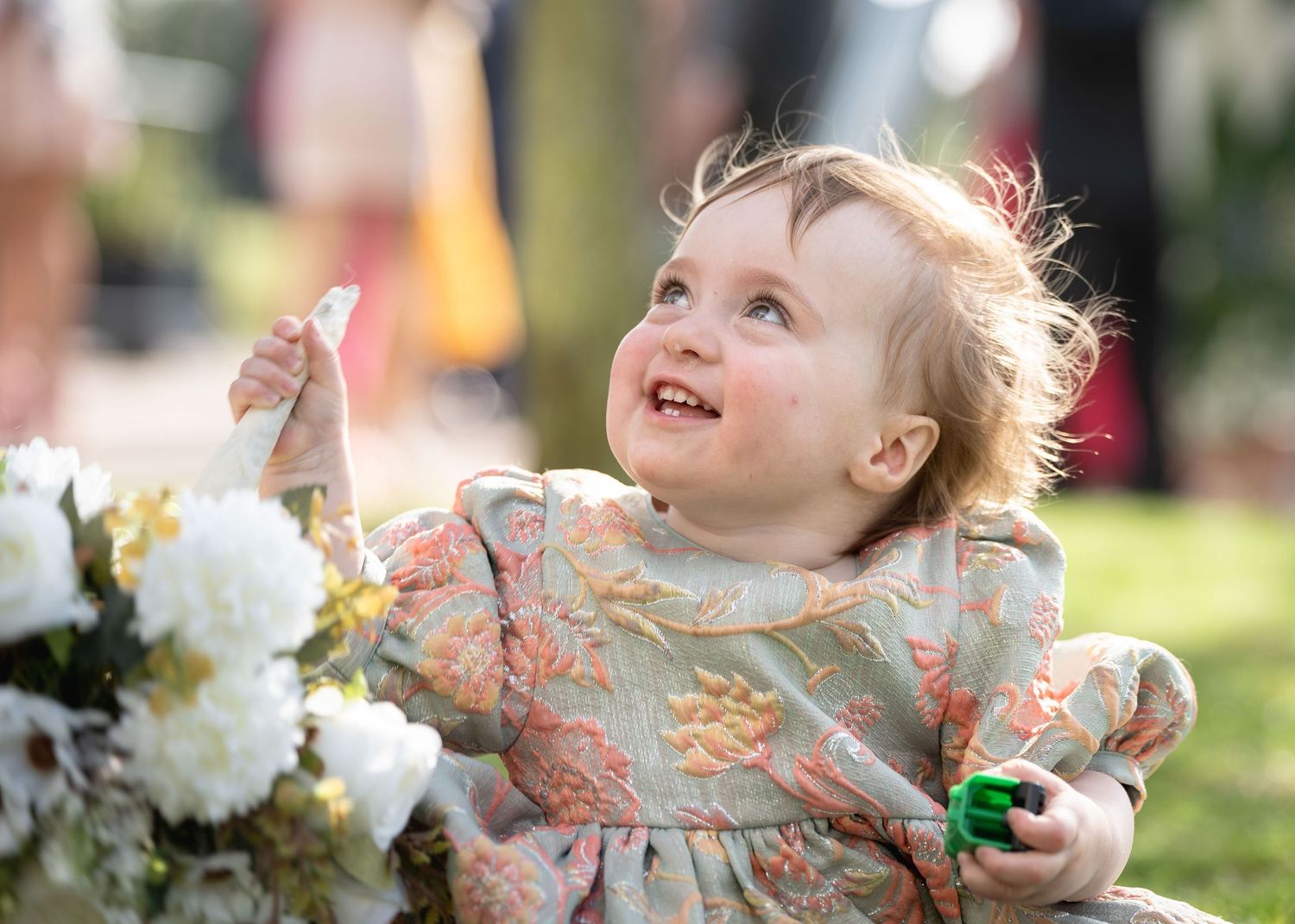 Candid photo of a little girl during a wedding