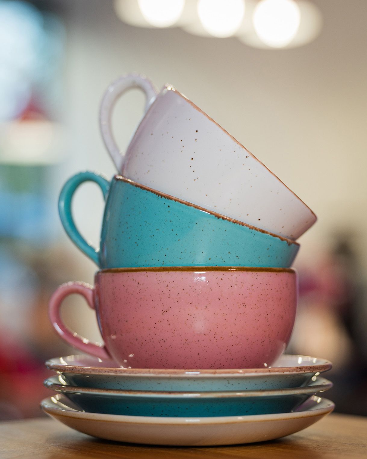 Close-up of cups stacked on top of each other at cinnammmm cafe