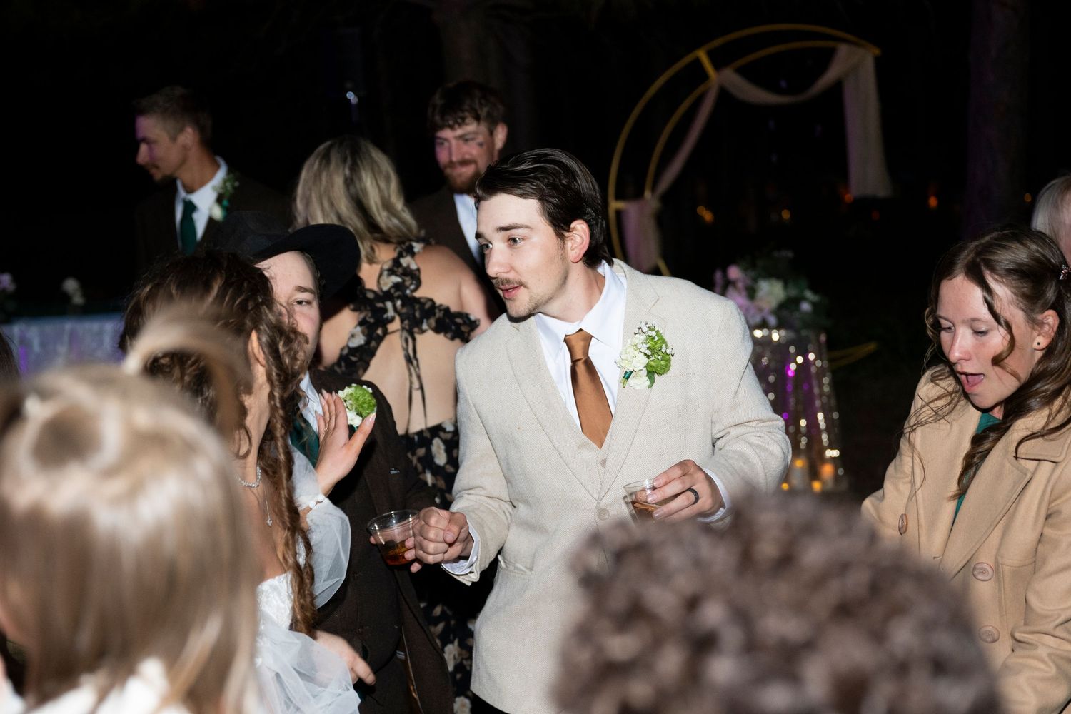The groom dances during a wedding reception in the dalles, oregon
