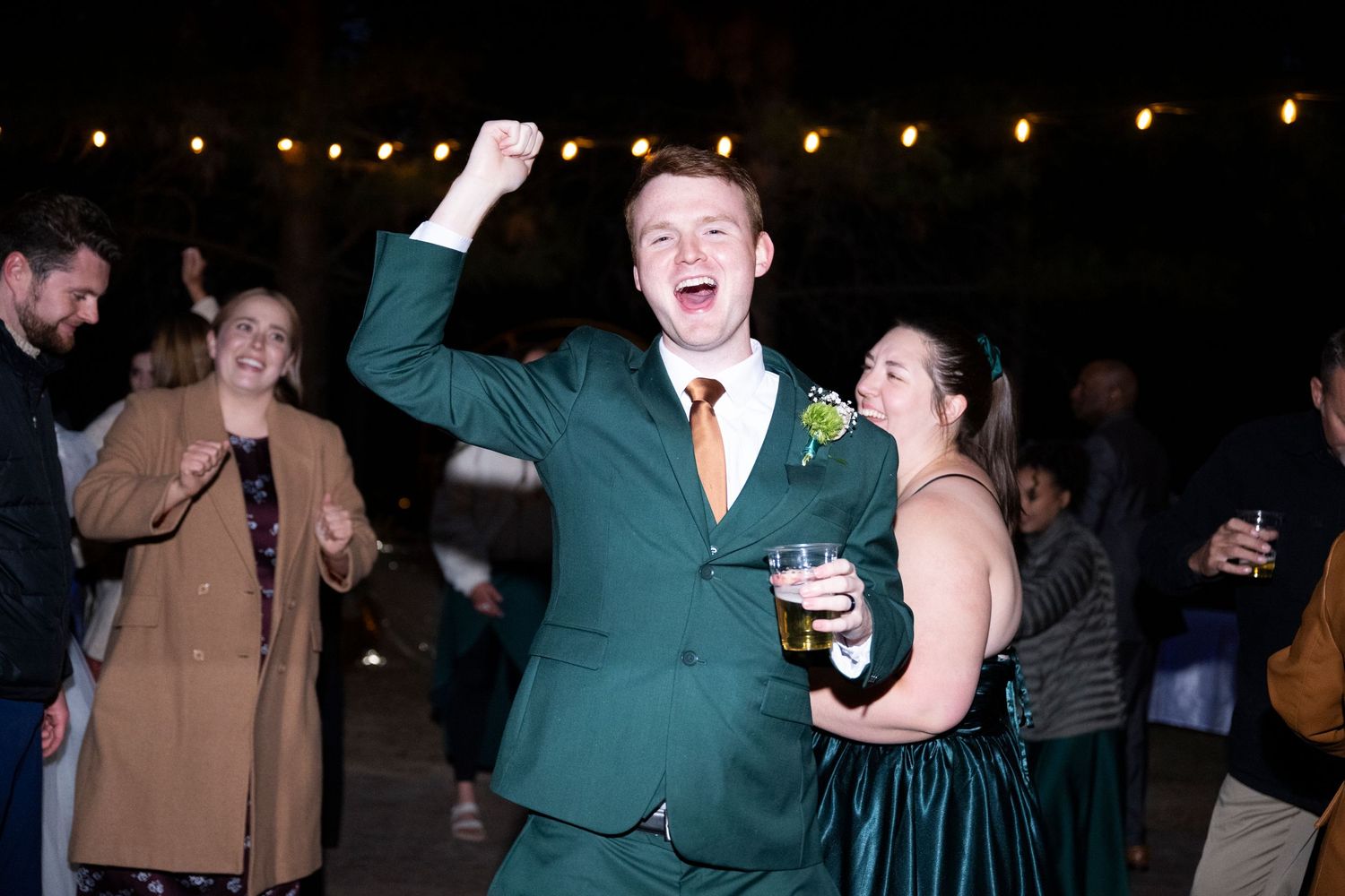 Bridesman dances during an oregon wedding reception