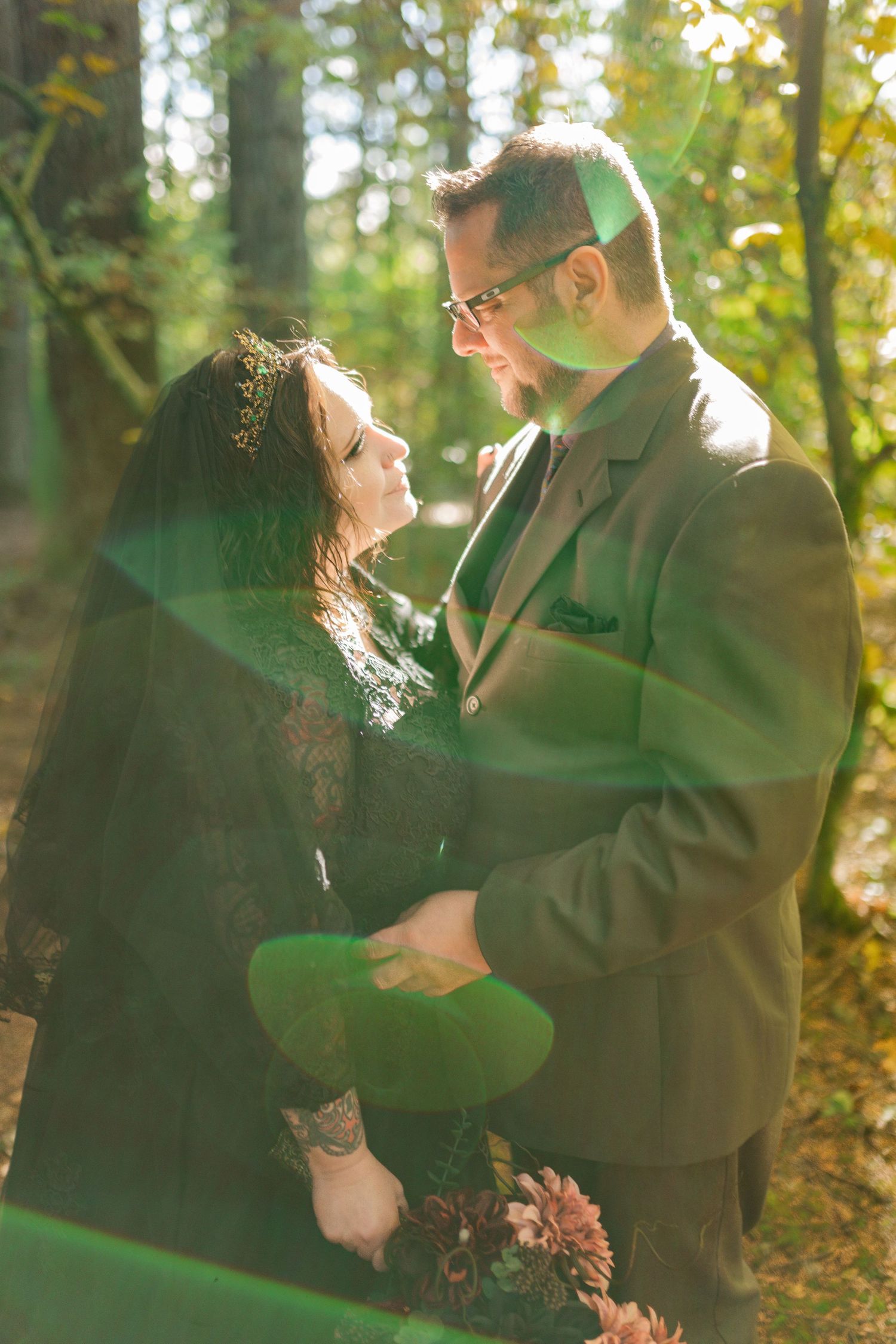 A romantic autumn forest scene with sunlight filtering through yellow leaves.
