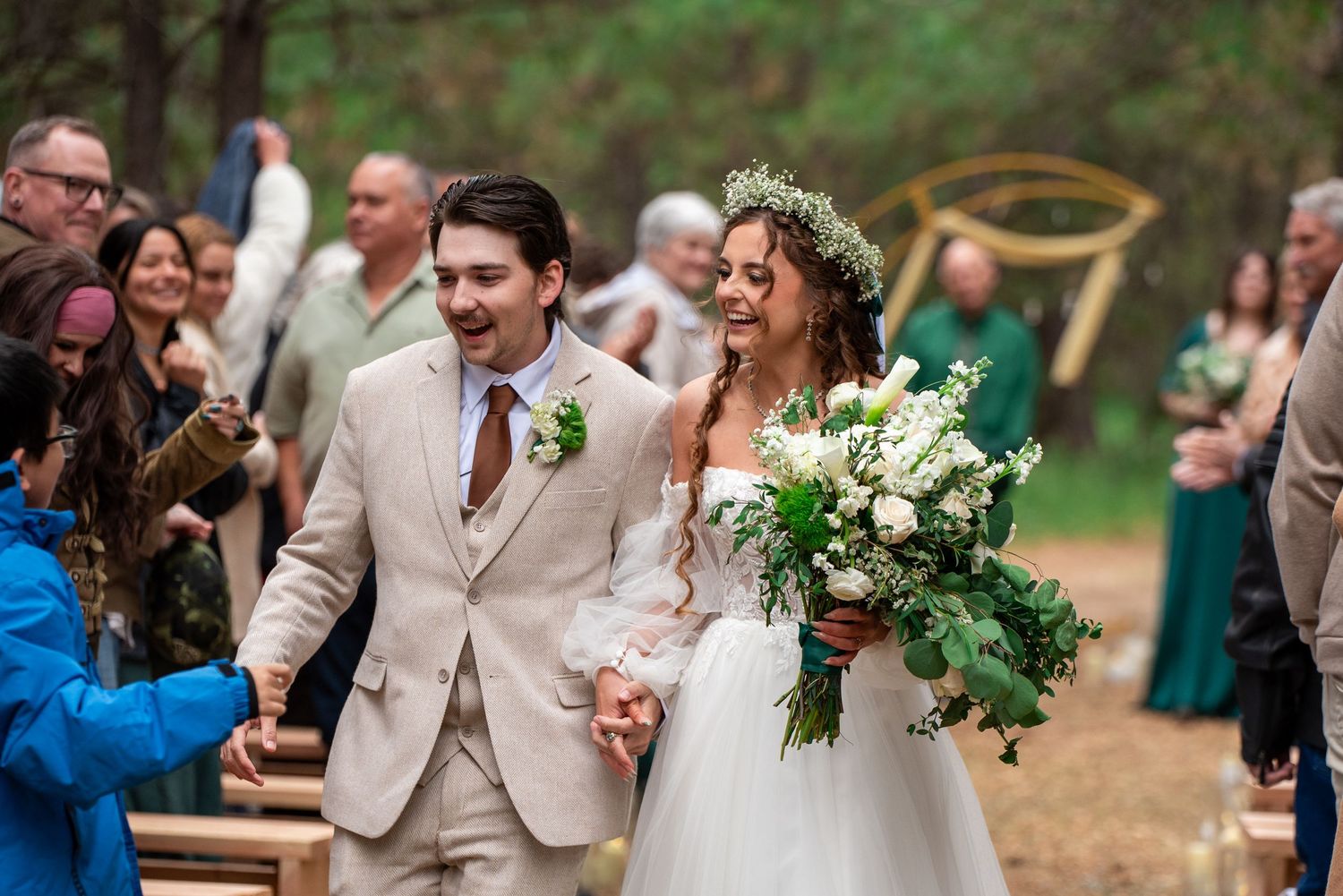 Bride and groom greet guests after an oregon wedding ceremony