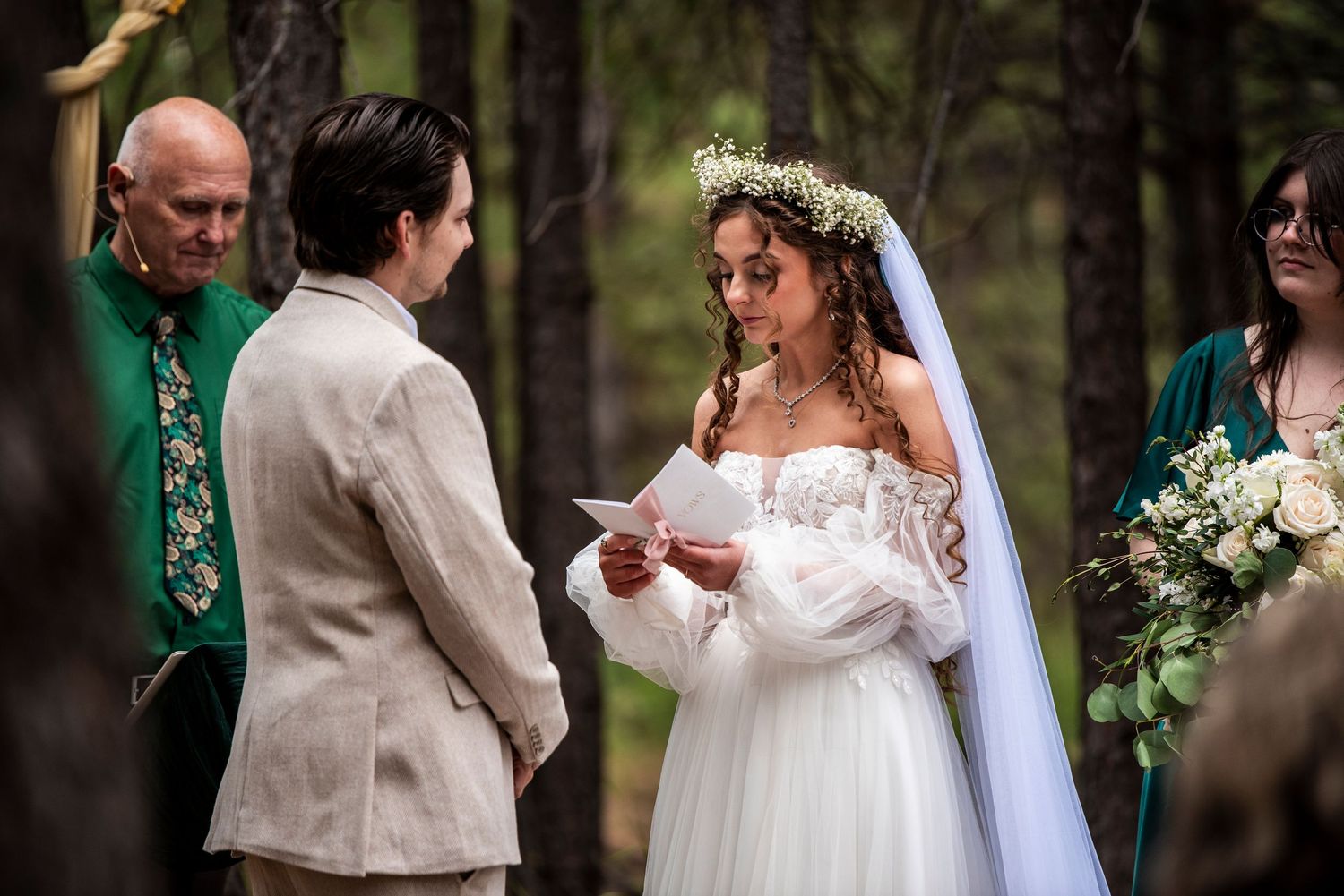 An oregon bride reads her vows during a wedding ceremony in the dalles