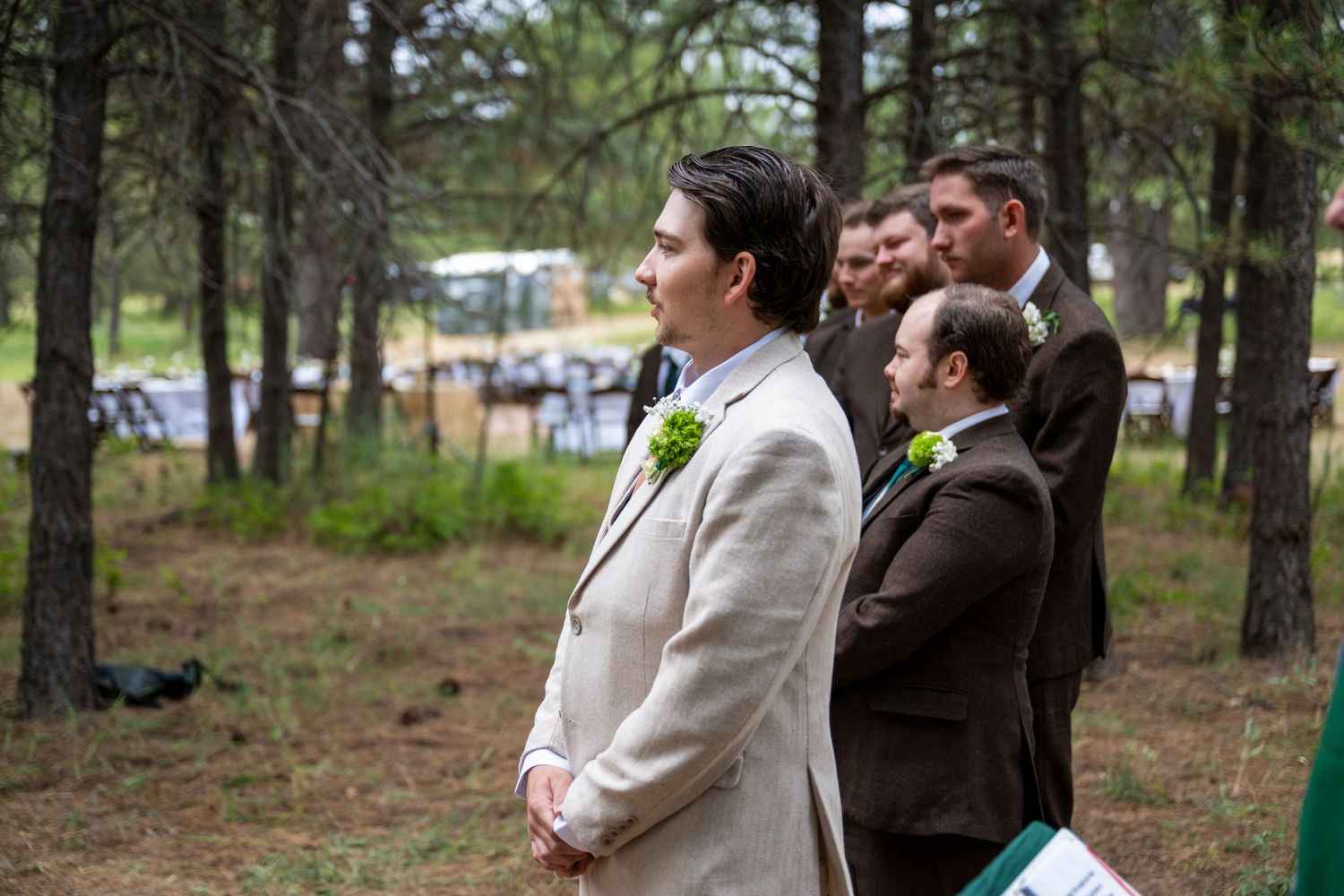 A group awaits his bride during their wedding ceremony in the dalles, oregon